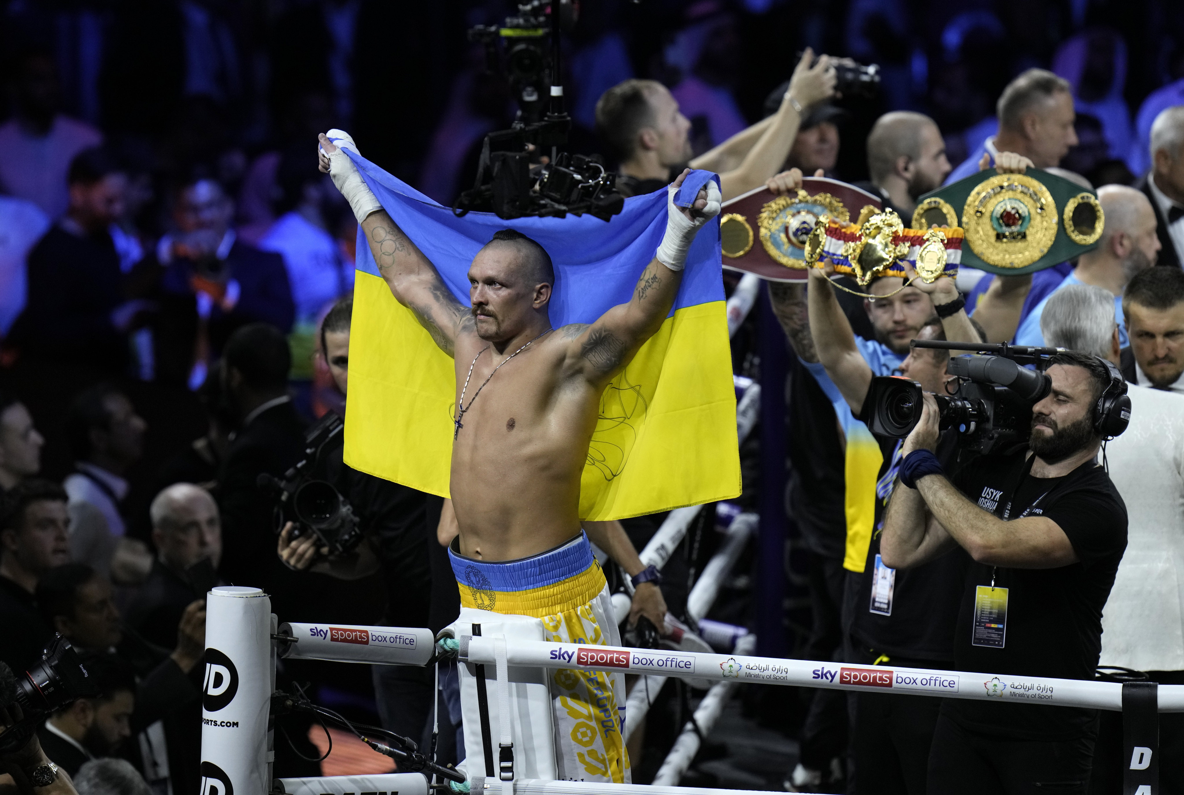 Ukraine’s Oleksandr Usyk celebrates after beating Britain’s Anthony Joshua to retain his world heavyweight title at King Abdullah Sports City in Jeddah, Saudi Arabia. Photo: AP