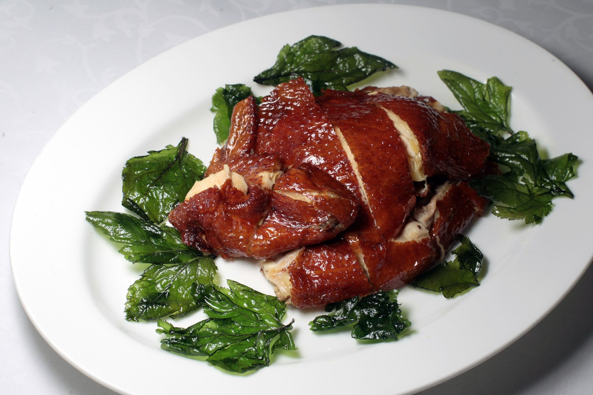 Tea-smoked crispy chicken at One Harbour Road, Grand Hyatt Hong Kong. Photo: Thomas Yau