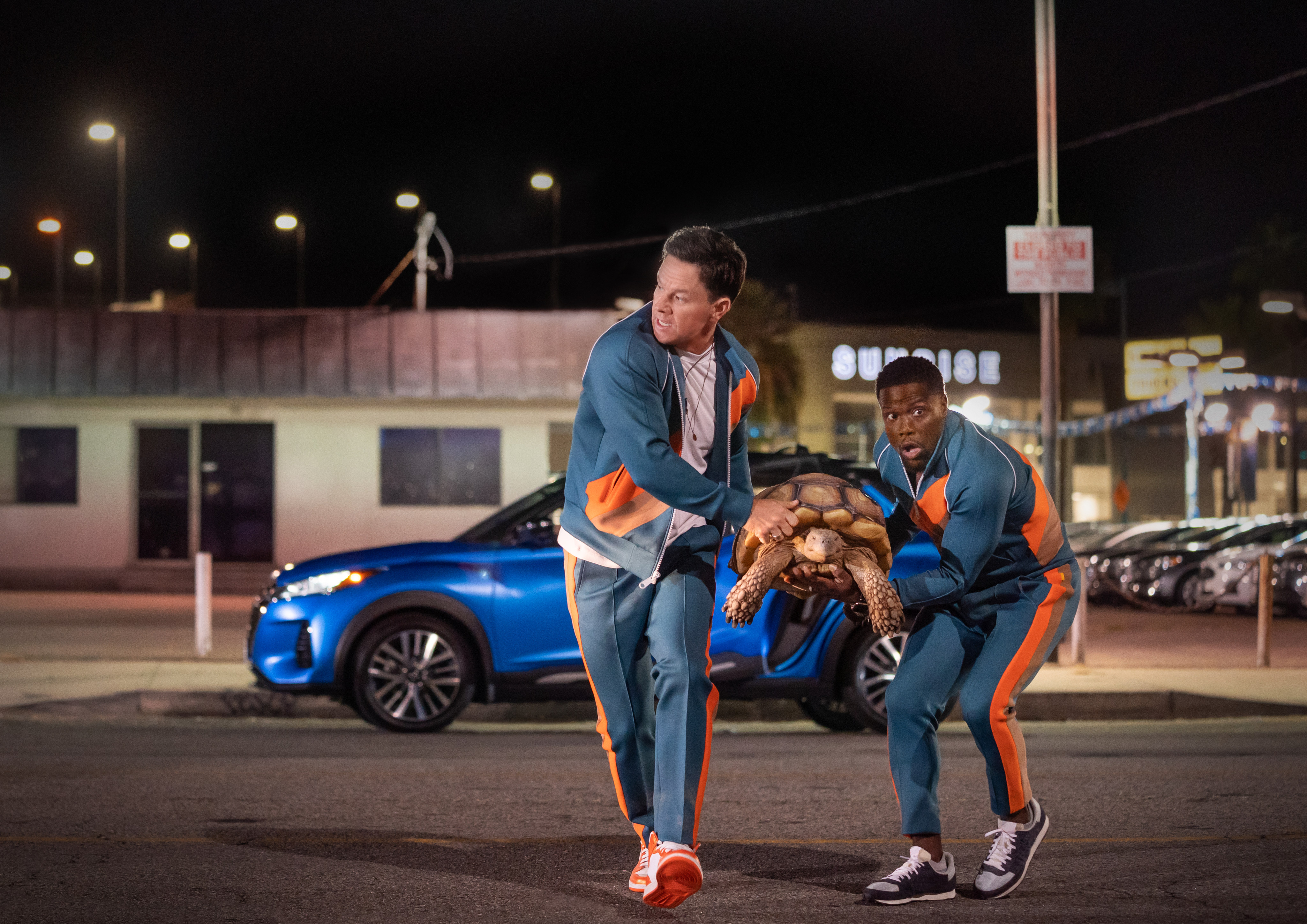 Mark Wahlberg (left) as Huck and Kevin Hart as Sonny in a still from Me Time. Photo: Saeed Adyani/Netflix