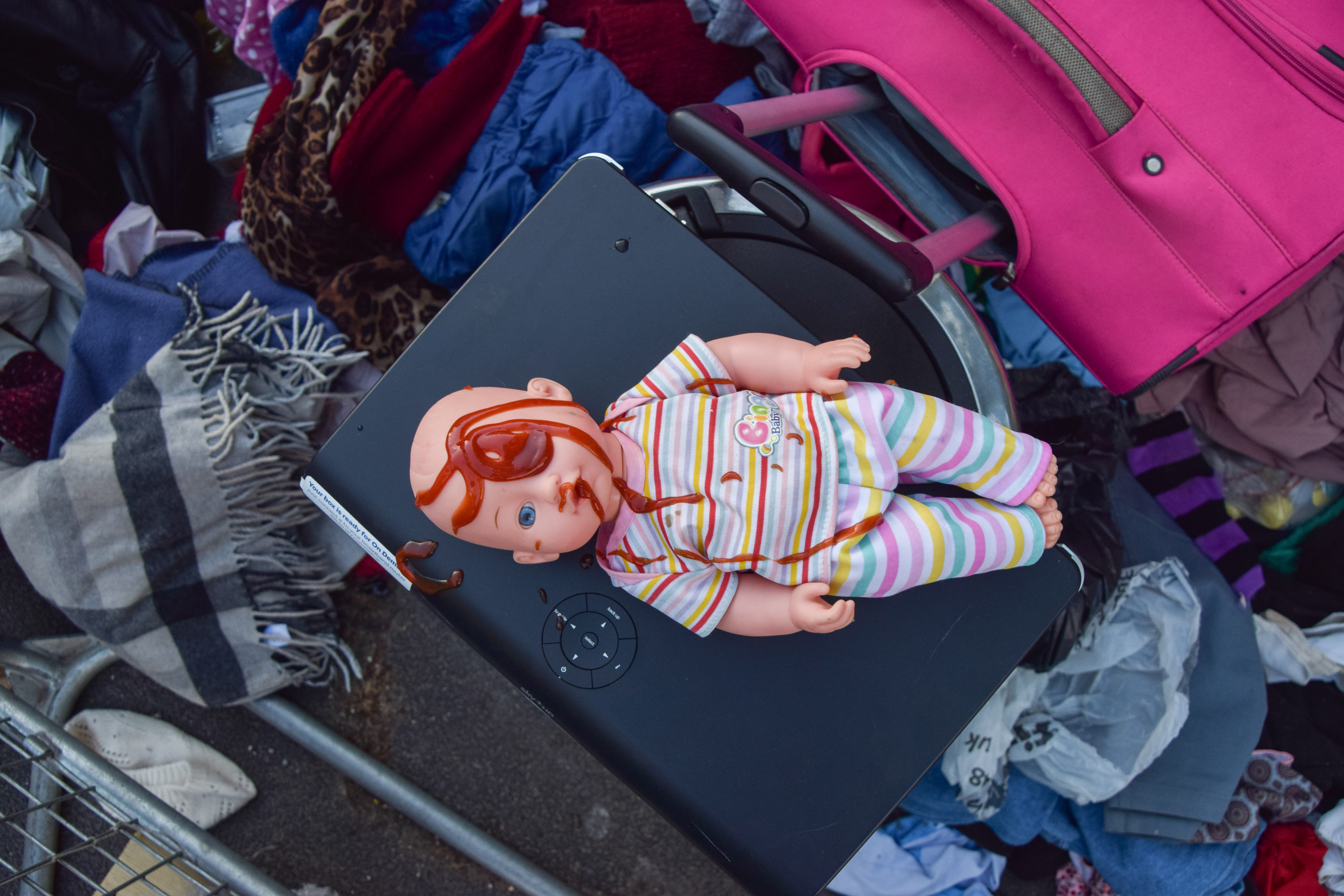 A baby doll covered in fake blood is seen during a protest in solidarity with Ukraine outside the Russian Embassy in London on April 7. Daily demonisation of each other is fragmenting trust between nation states. Photo: Zuma Press Wire/dpa