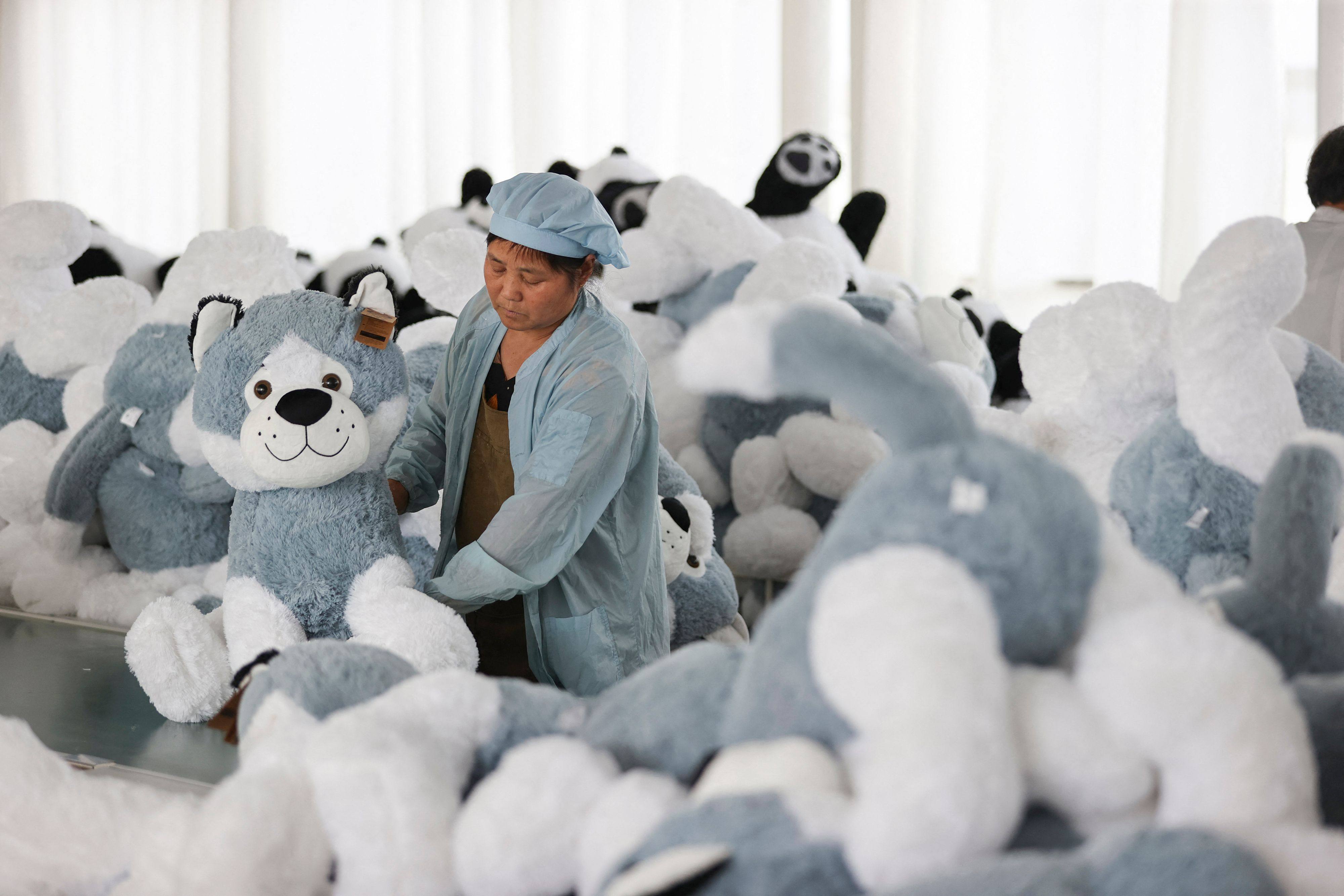 A worker produces stuffed toys for export at a factory in Lianyungang, in China’s eastern Jiangsu province, on July 7. Photo: AFP