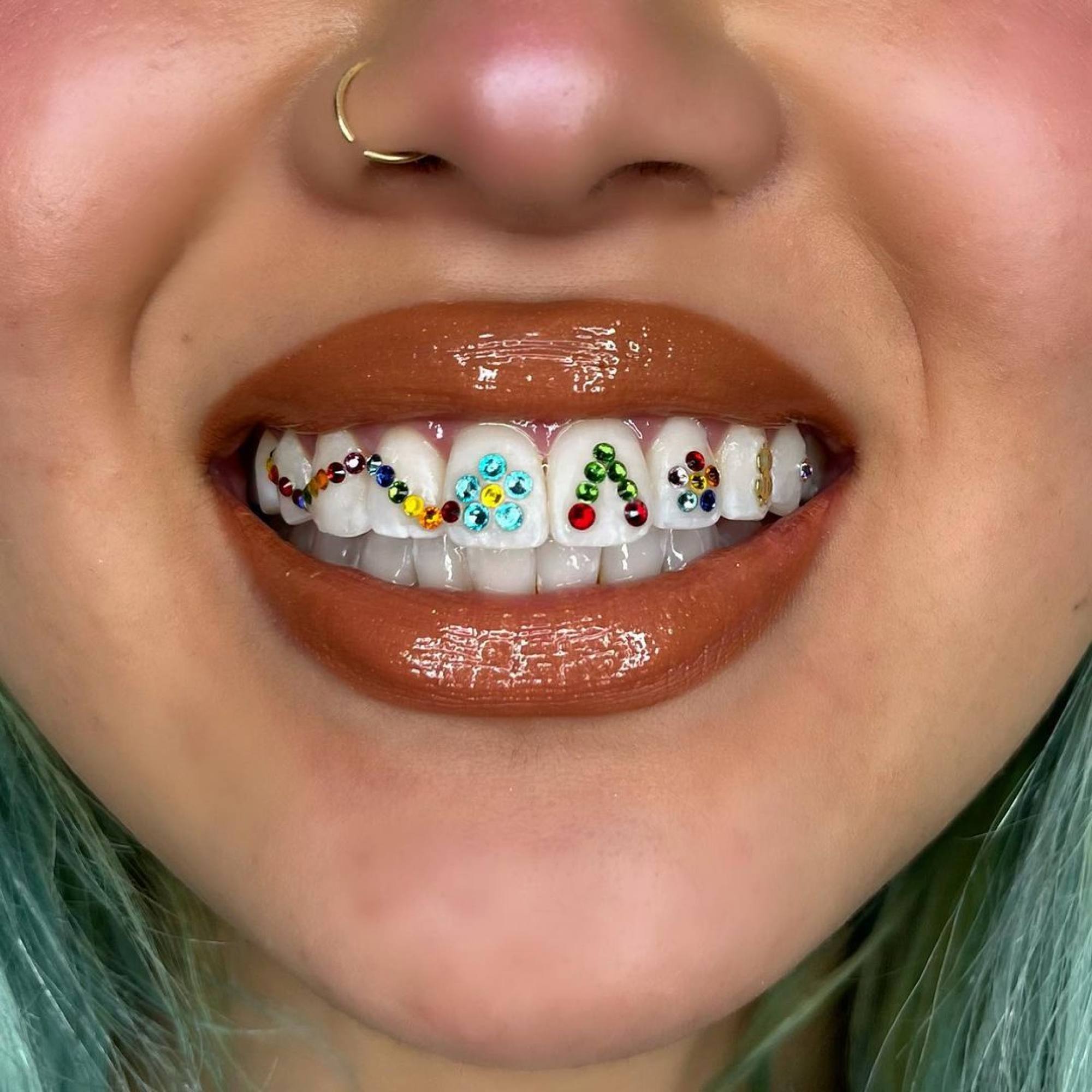 Drake, Katy Perry, Hailey Bieber: tooth gems go viral as celebs and TikTok  stars show off sparkly stones in their smiles