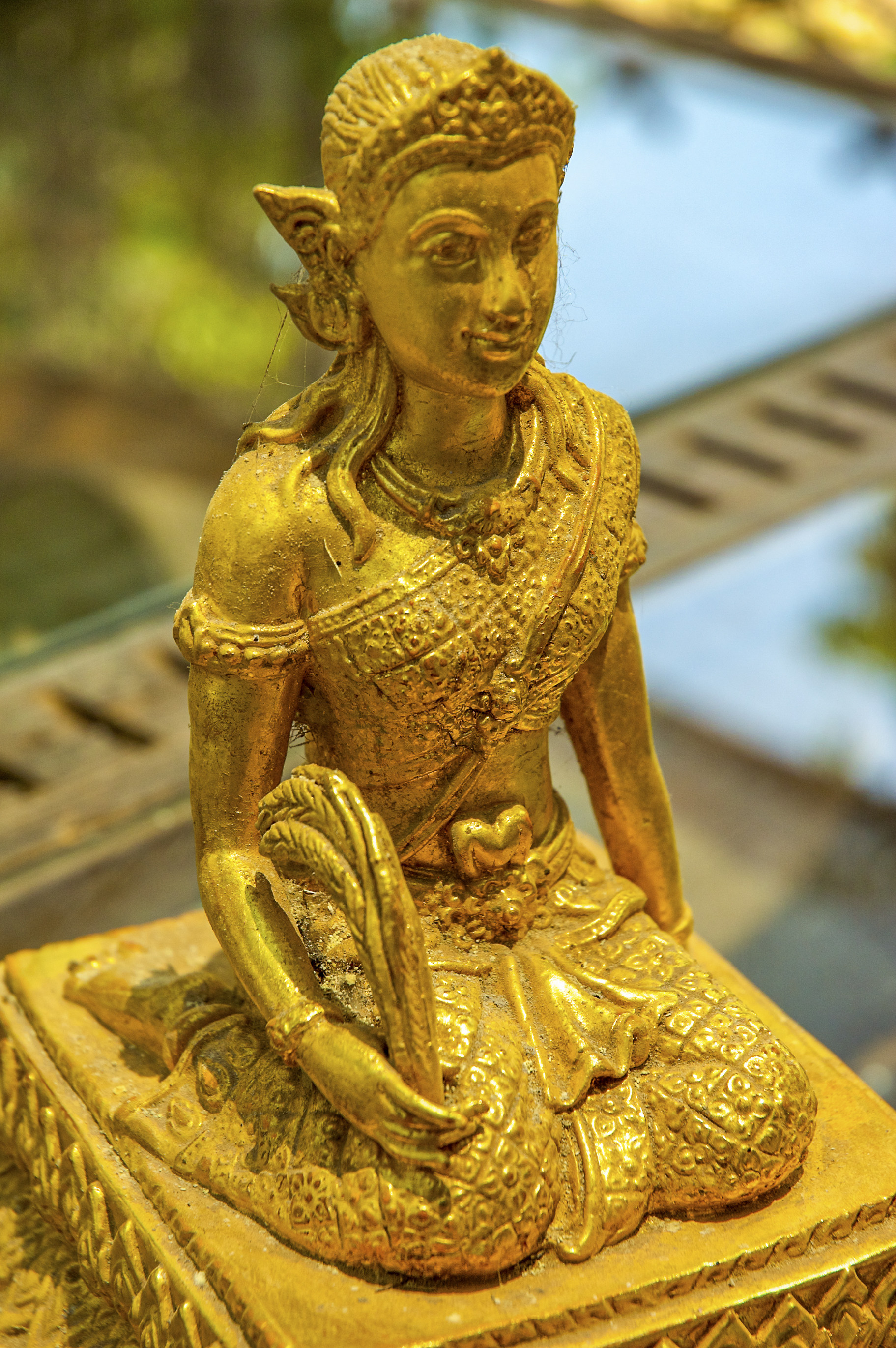 A Mae Phosop effigy. The rice goddess is worshipped and appeased with offerings by Thai rice farmers, in hopes for a good harvest. Photo: Ron Emmons
