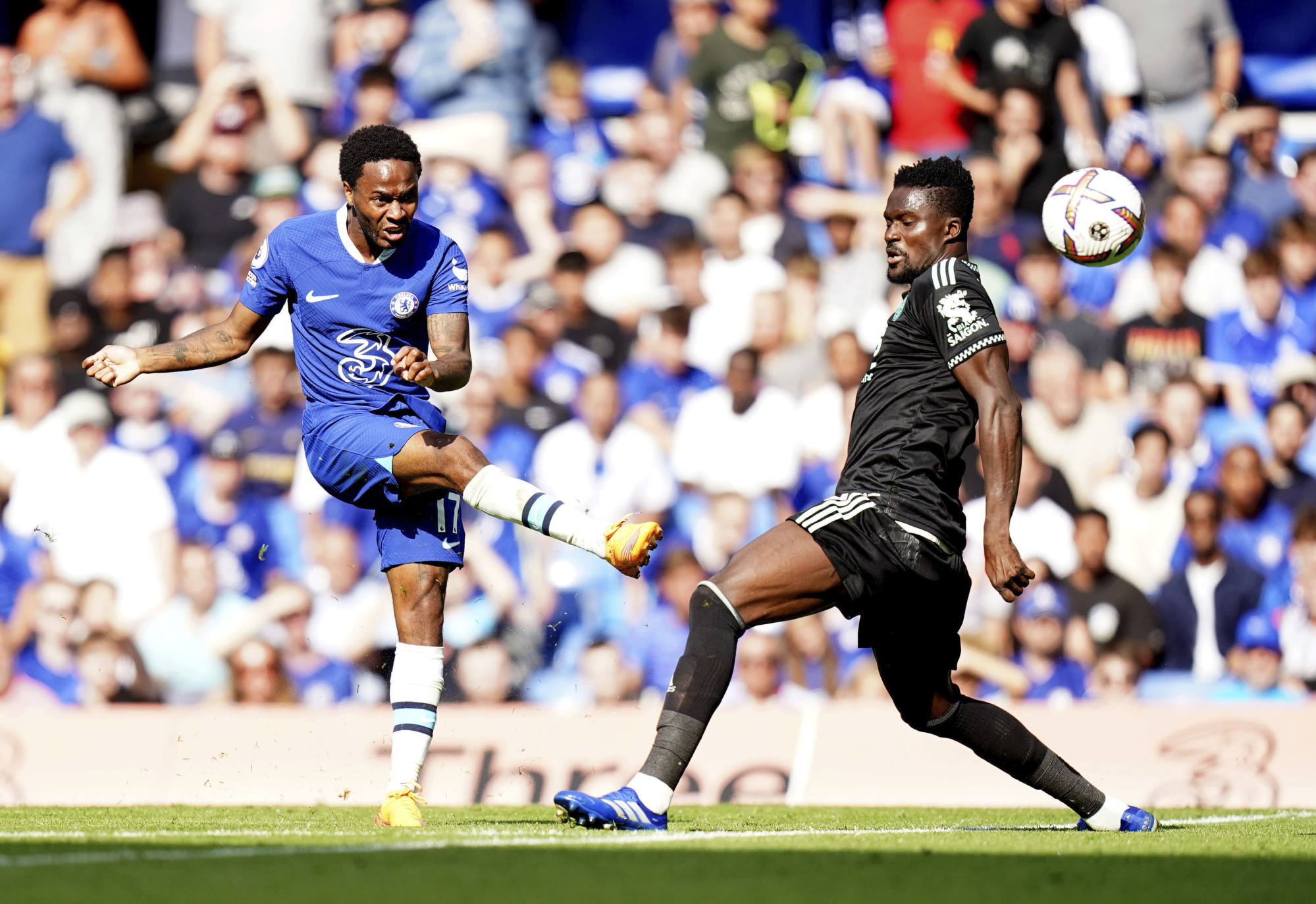 Chelsea’s Raheem Sterling scores the opening goal against Leicester City. Photo: AP