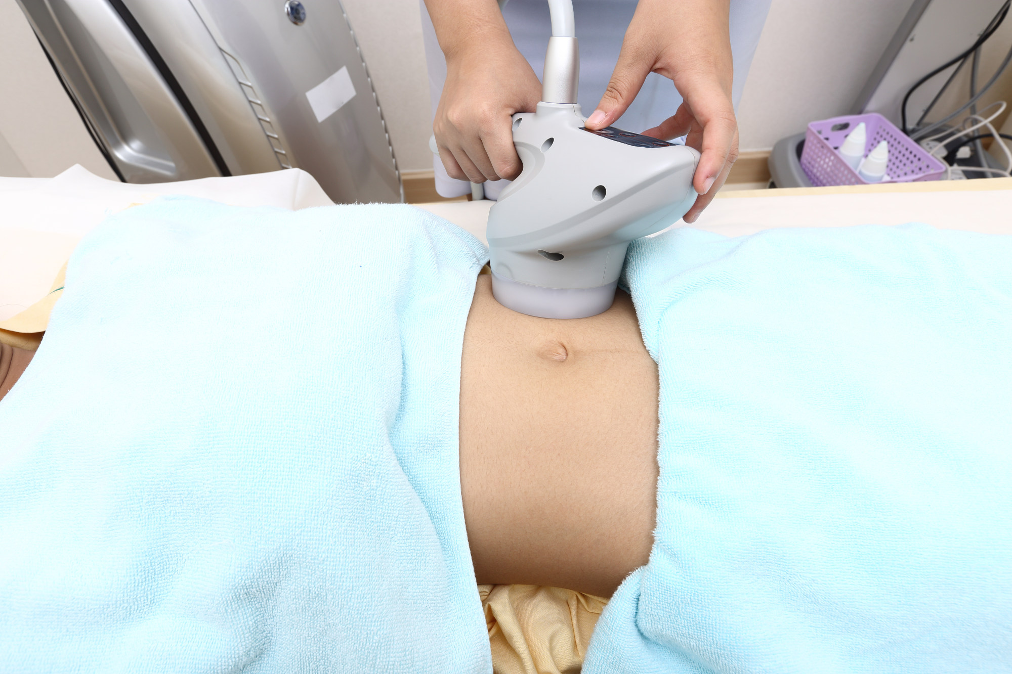 A patient receives Hifu treatment on her stomach. Photo: Shutterstock