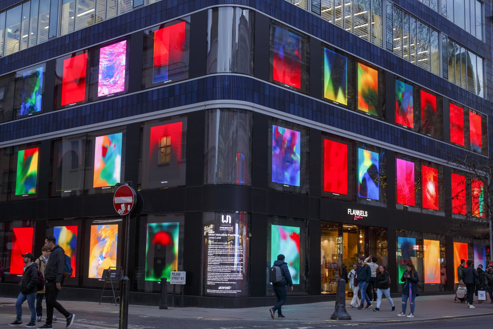 A series of NFT artworks collectively titled MVP Most Valuable Painting by artist Jonas Lund displayed on screens in the windows of The Flannels Group Ltd department store on Oxford Street, London, UK, on April 4. Photo: Bloomberg