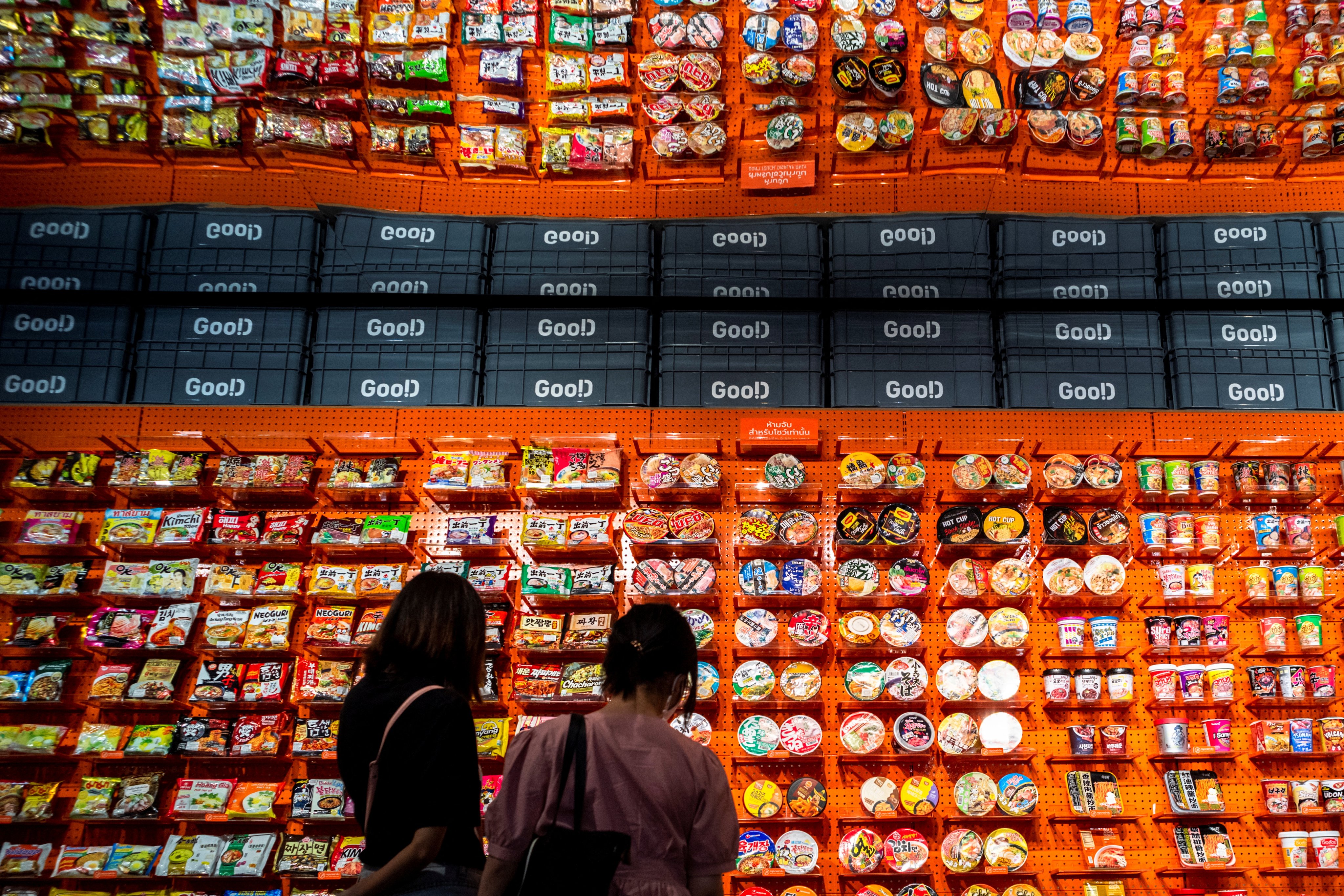People look at instant noodles at the Good Noodle store in Bangkok, Thailand. Photo: Reuters
