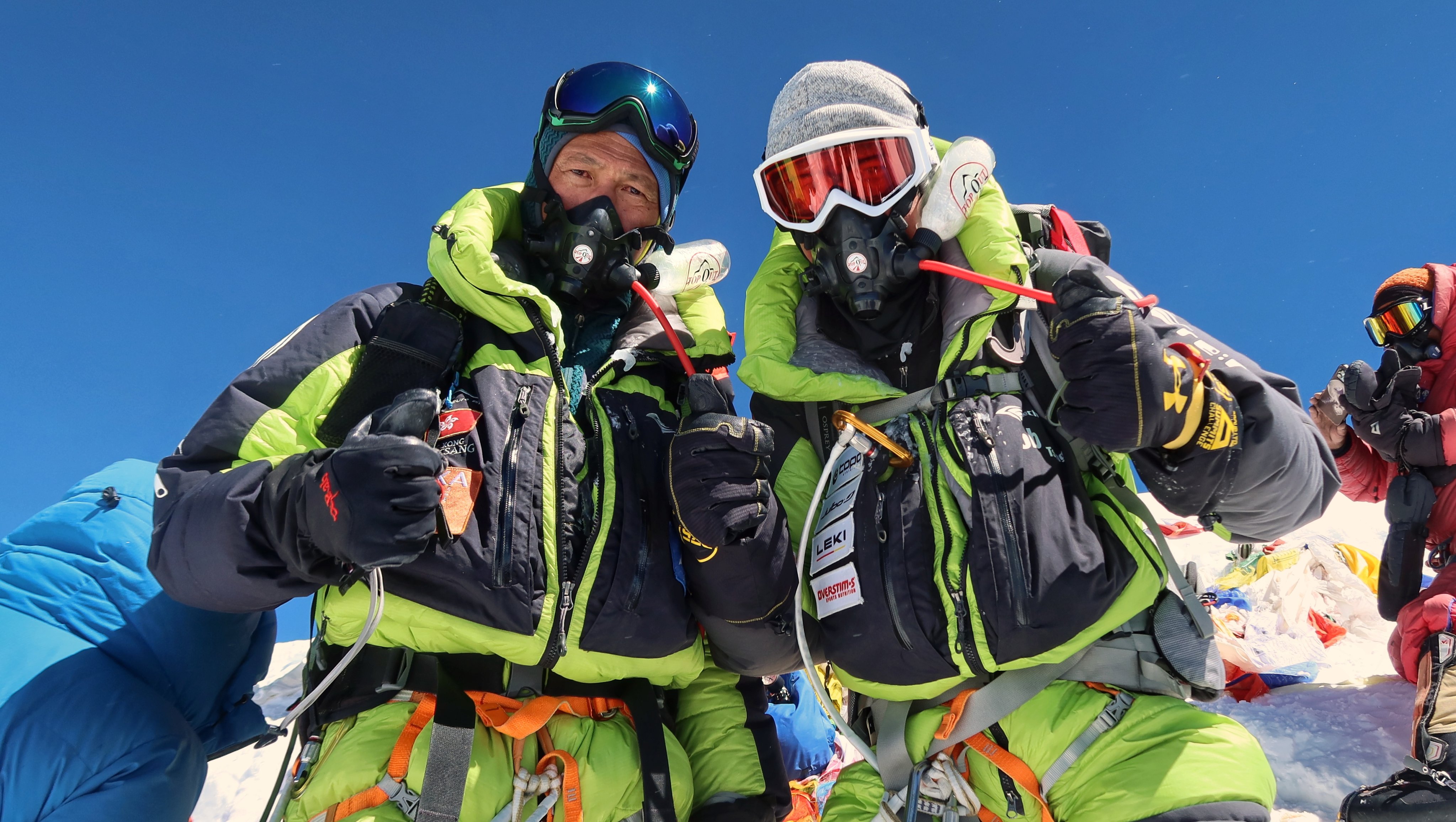 John Tsang (left) and his 18-year-old son Bob on the summit of Everest earlier this year. They talk about the physical and mental challenges they overcame to reach the summit. Photo: the Tsang family