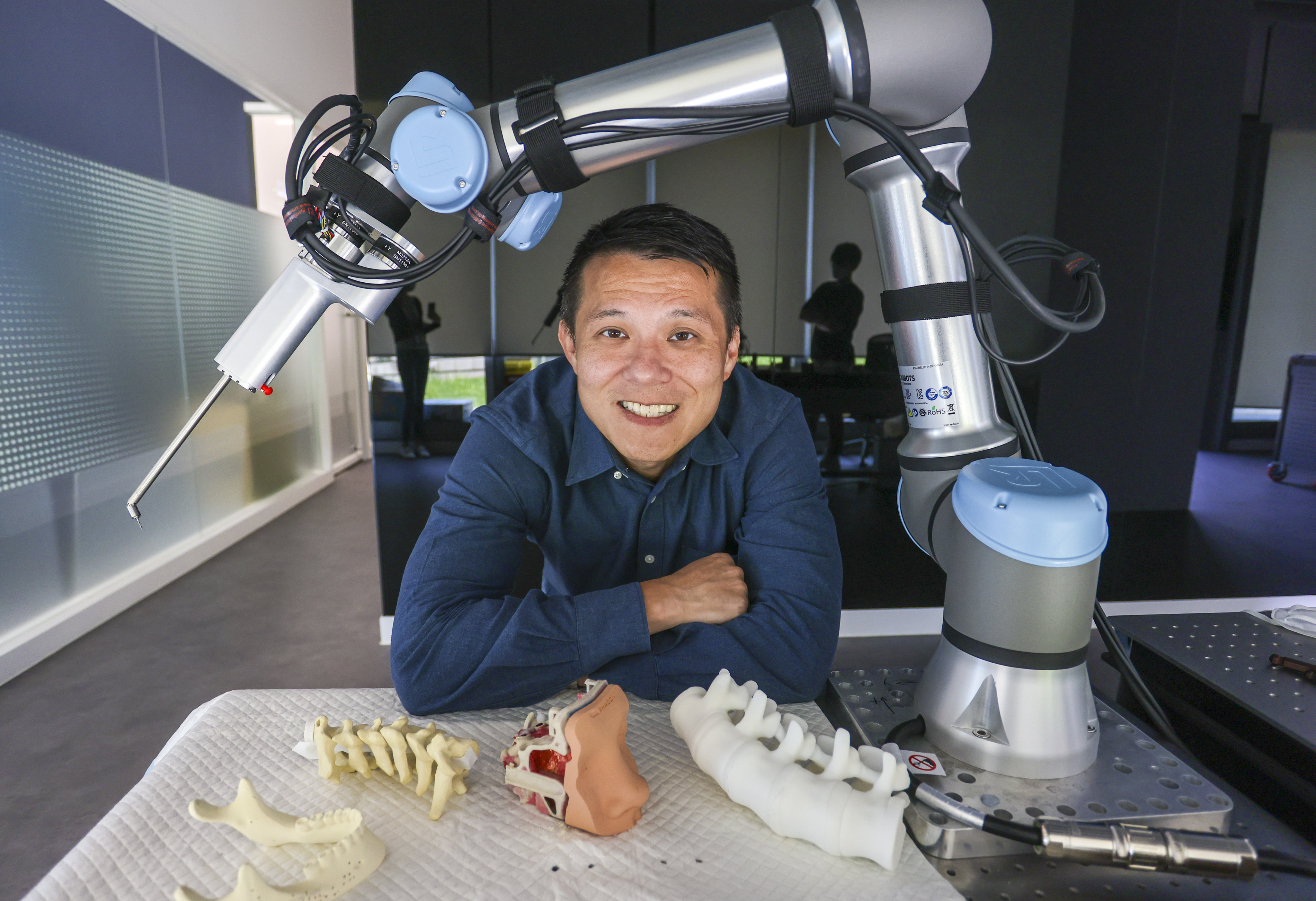 Cornerstone Robotics founder and Spirit of HK Awards 2022 nominee Samuel Au, with a drilling robot. Photo: Jonathan Wong