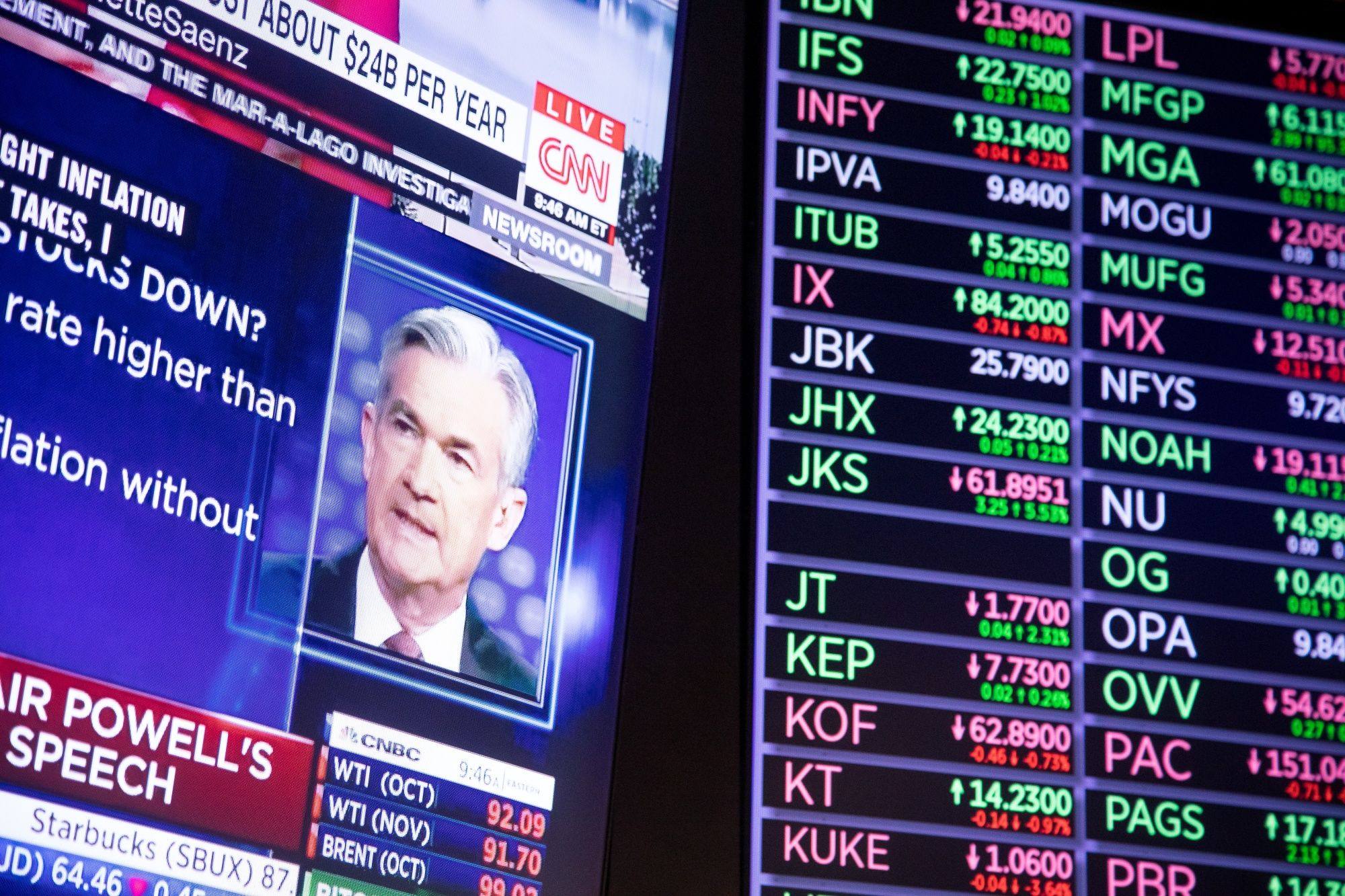 Stocks sink as Federal Reserve chairman Jerome Powell’s speech at the Jackson Hole economic symposium is broadcast on the floor of the New York Stock Exchange on August 26. Photo: Bloomberg