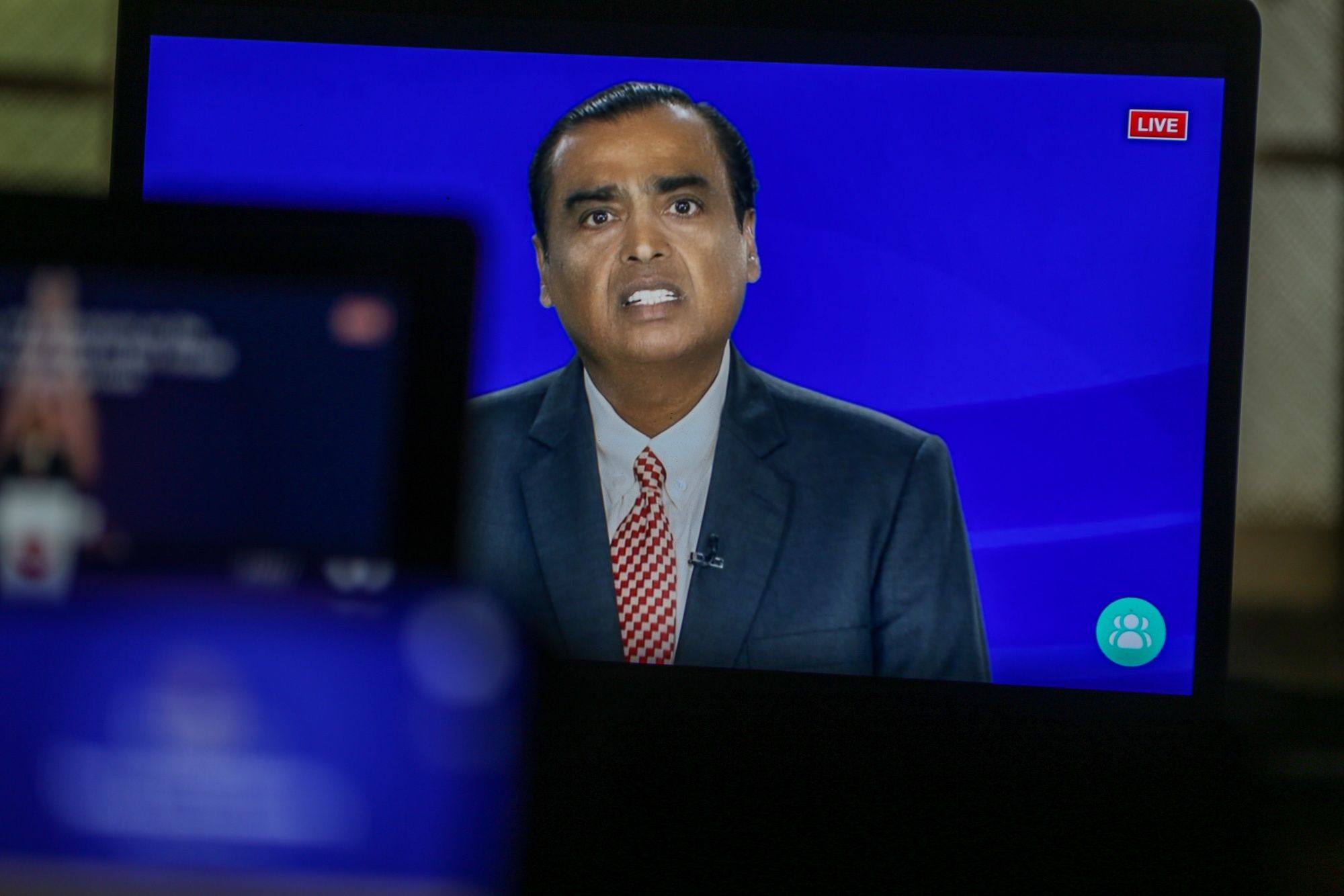 Mukesh Ambani, chairman and managing director of the Reliance Industries Ltd, speaks via live-stream during the annual general meeting in Mumbai, India, on August 29. Photo: Bloomberg