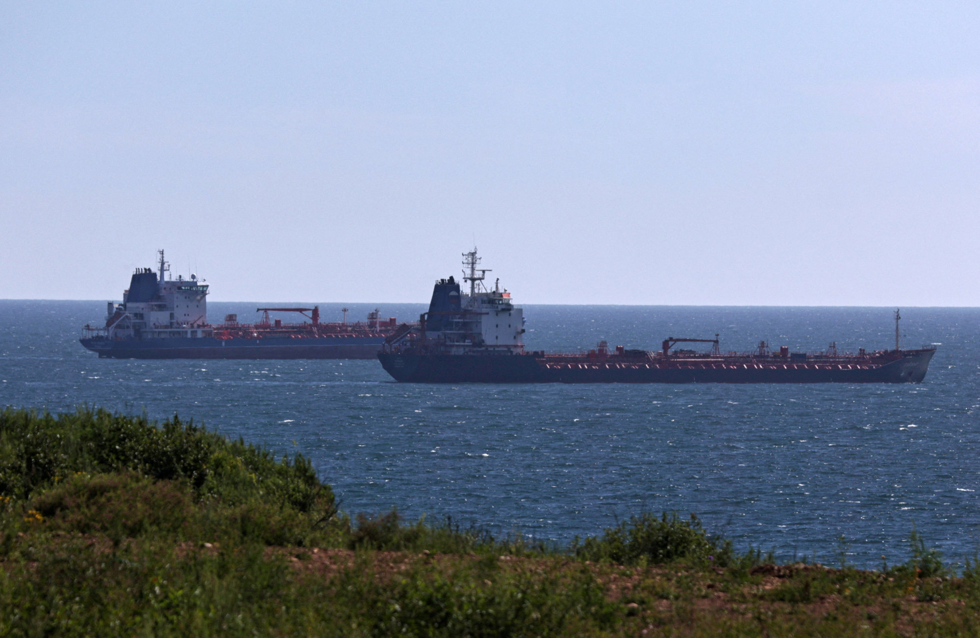 Oil tankers sail along Nakhodka Bay near the port city of Nakhodka, Russia. Photo: Reuters/File