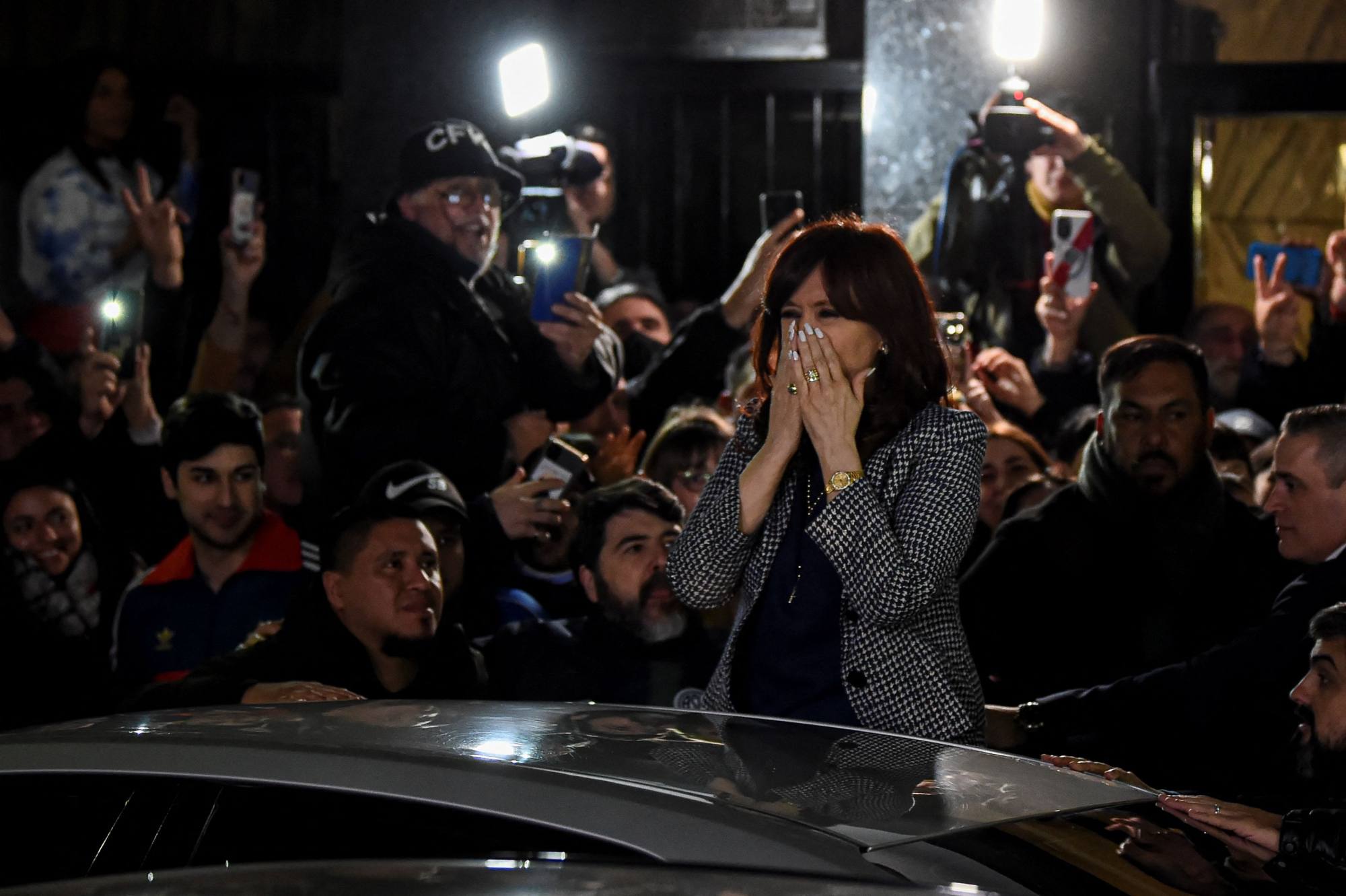 Argentina’s Vice-President Cristina Fernandez de Kirchner greets supporters outside her residence in Buenos Aires on Thursday. Photo: AFP