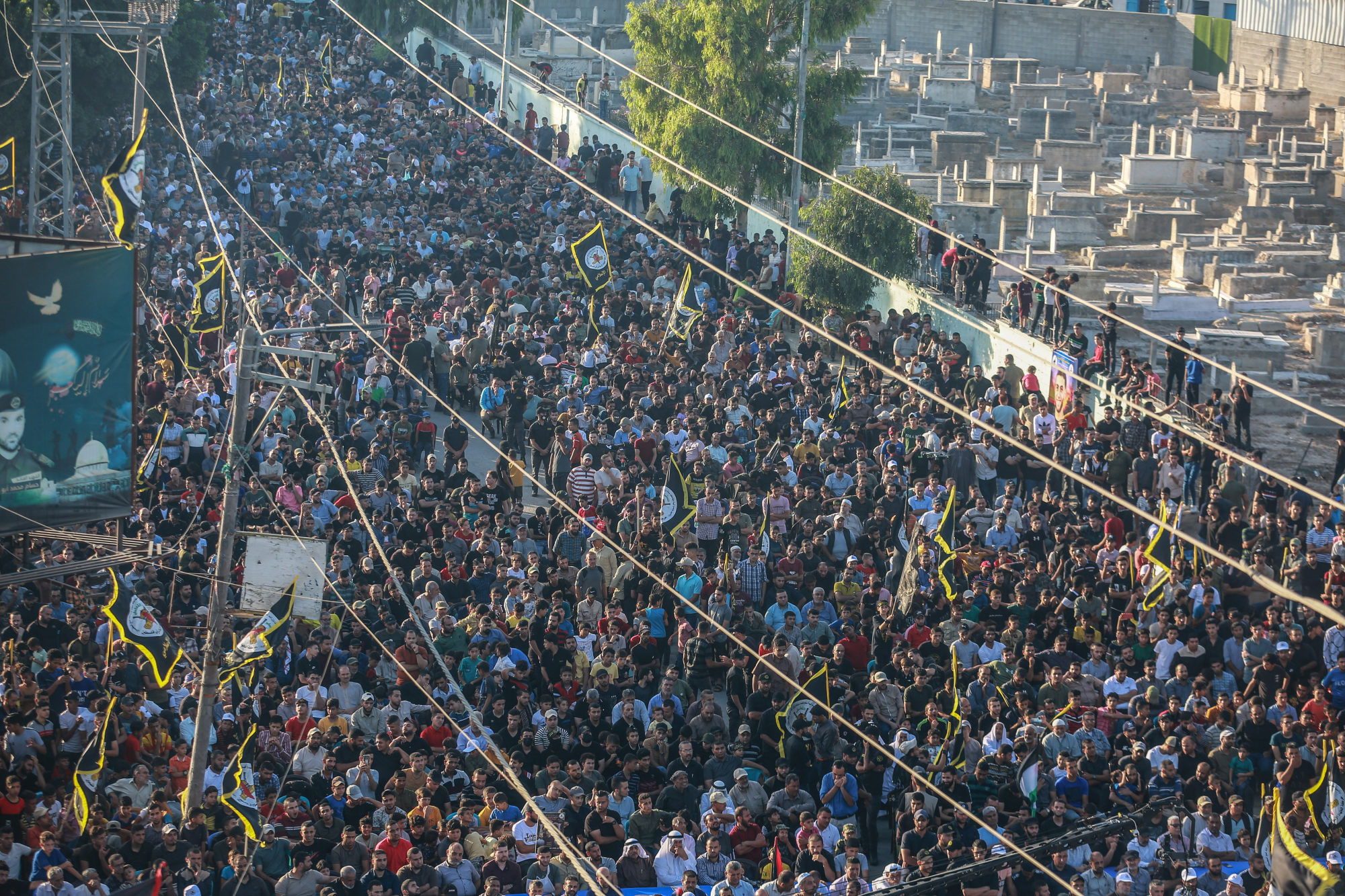 Palestinians attend the Islamic Jihad group rally on August 25 to pay tribute to their fighters who were killed in the latest round of fighting between Israel and Gaza militants in the Shejaiya neighbourhood. Photo: dpa