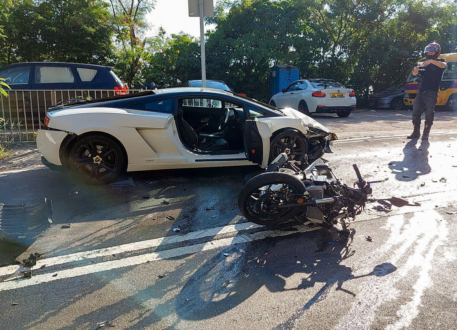 Hong Kong motorcyclist seriously injured in head-on collision with  Lamborghini on Shek O Road | South China Morning Post