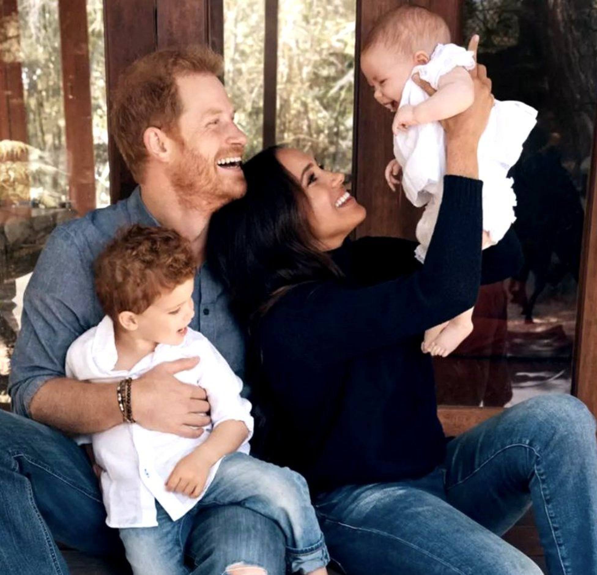 Britain’s Prince Harry and Meghan shared their first photo of baby Lilibet Diana, seen here with the couple and older brother Archie. Photo: Alexi Lubormirski