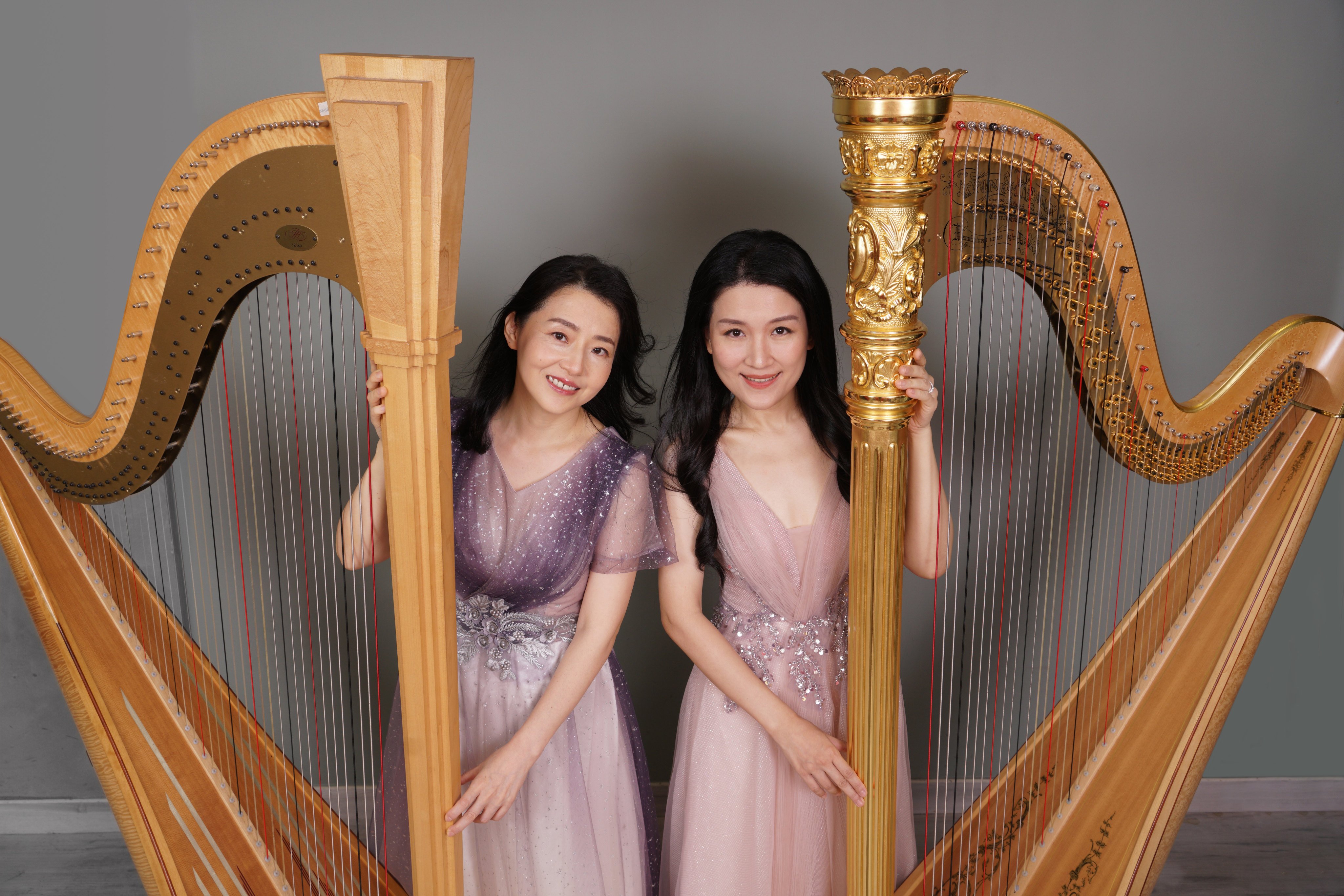 Harpists Dan Yu (left) and Lau Yee-yeung. Photo: CCOHK