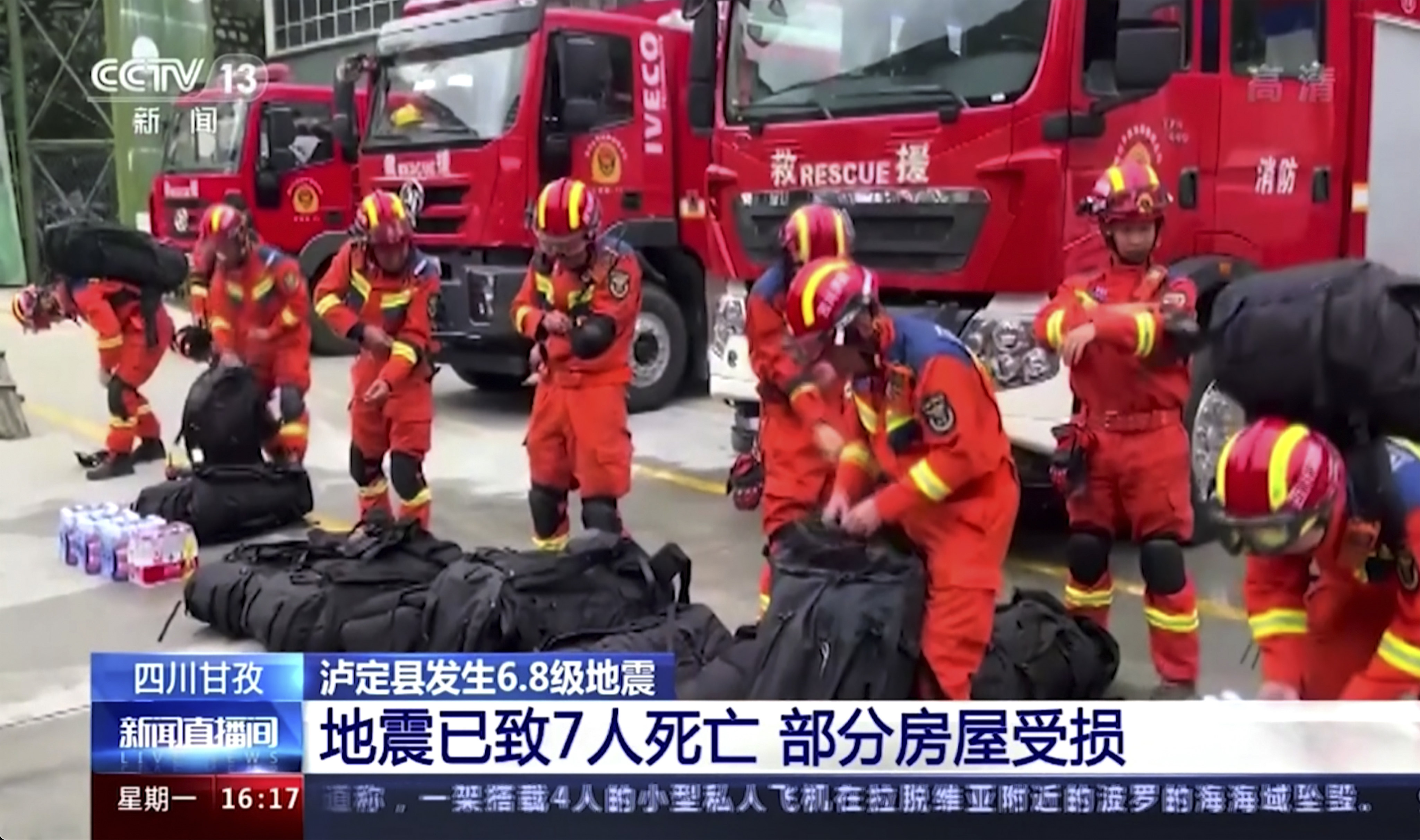 Firefighters get ready for rescue work in  Luding county of southwest China’s Sichuan province. Photo: CCTV via AP 
