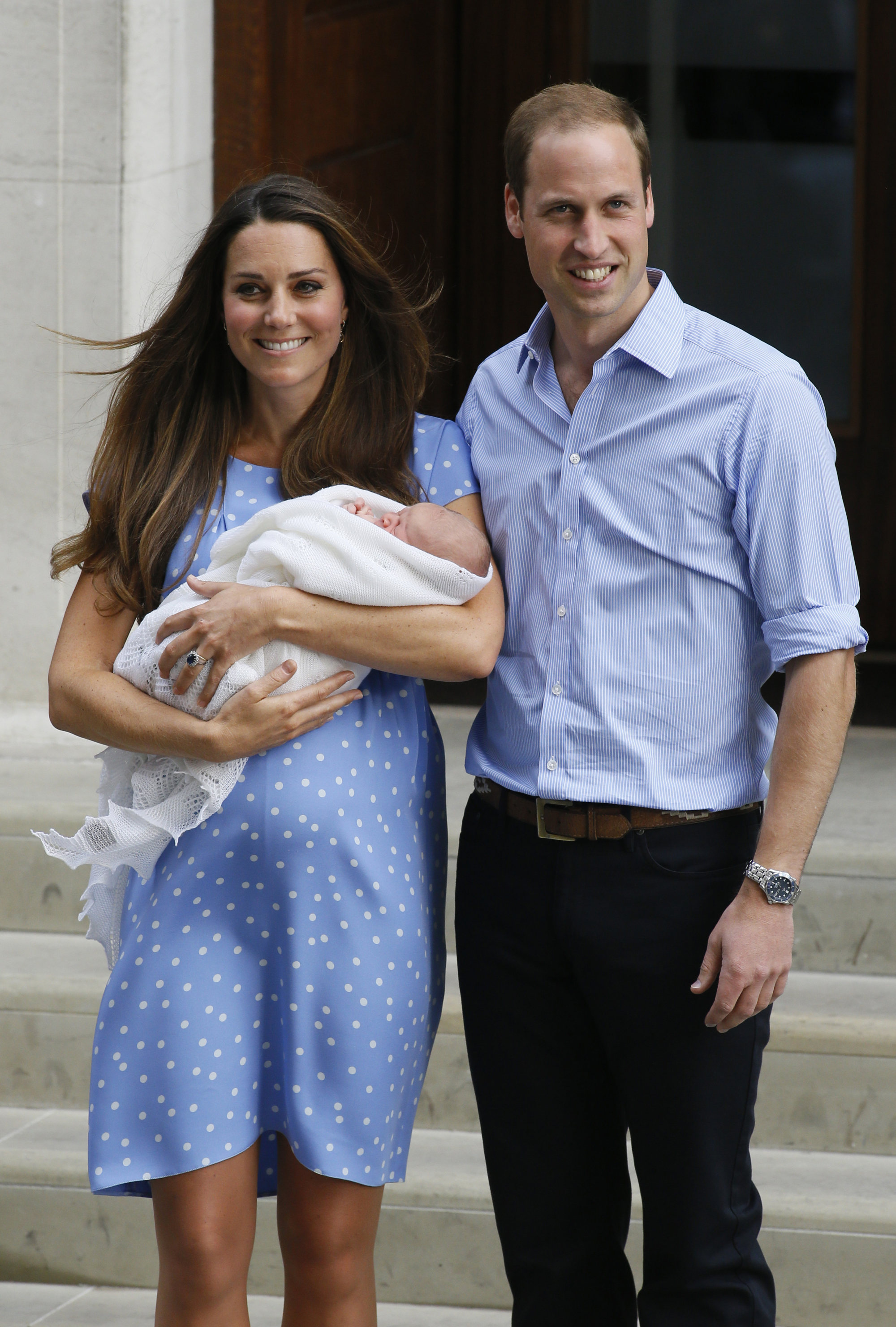 Britain’s Prince William and Kate, Duchess of Cambridge pose with George, the Prince of Cambridge outside St Mary’s Hospital in London where the duchess gave birth in July 2013. Photo: AP Photo