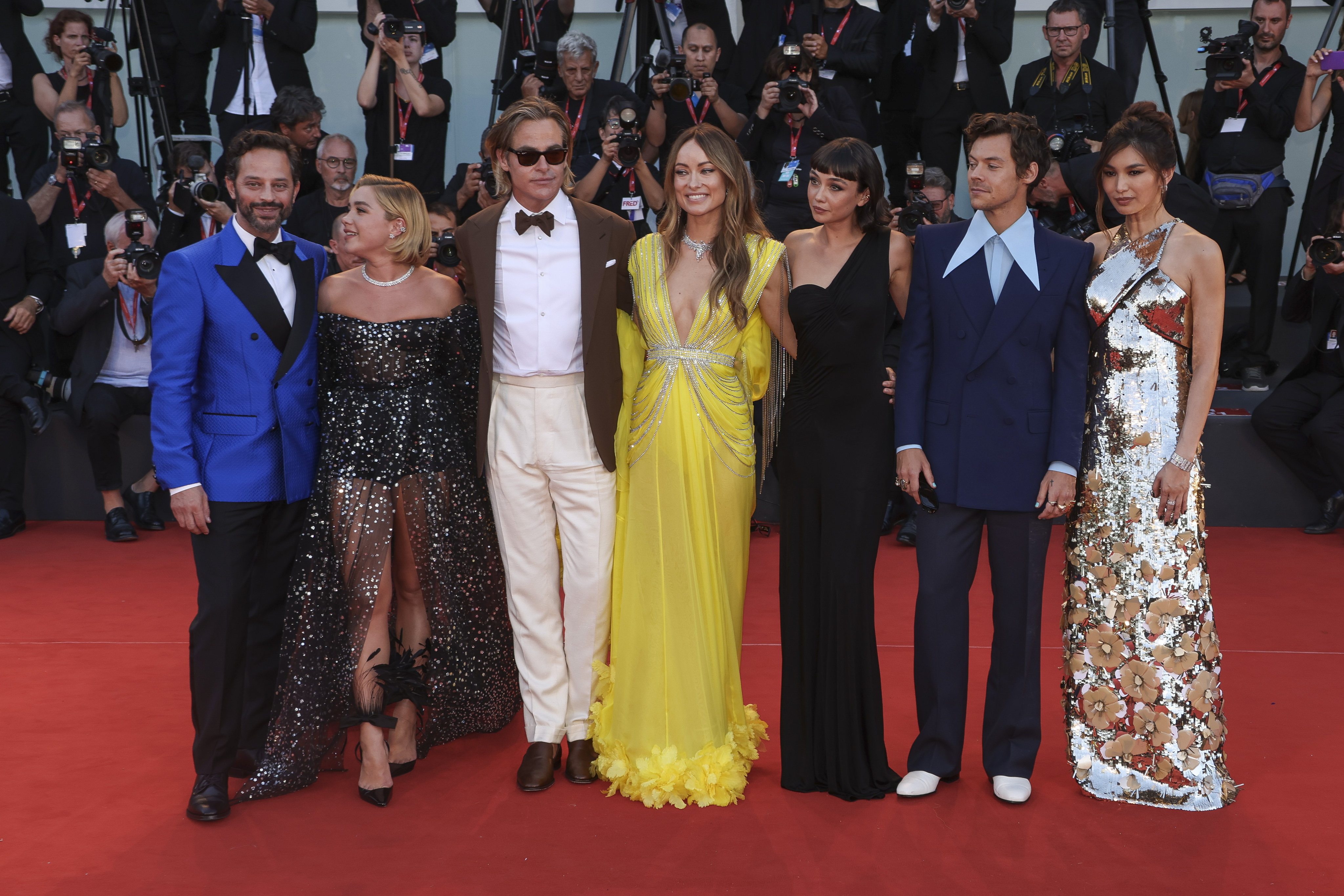 Gemma Chan, Harry Styles, Sydney Chandler, director Olivia Wilde, Chris Pine, Florence Pugh and Nick Kroll pose for photographers on the red carpet in Venice ahead of the premiere of the film Don’t Worry Darling. Photo by Joel C Ryan/Invision/AP