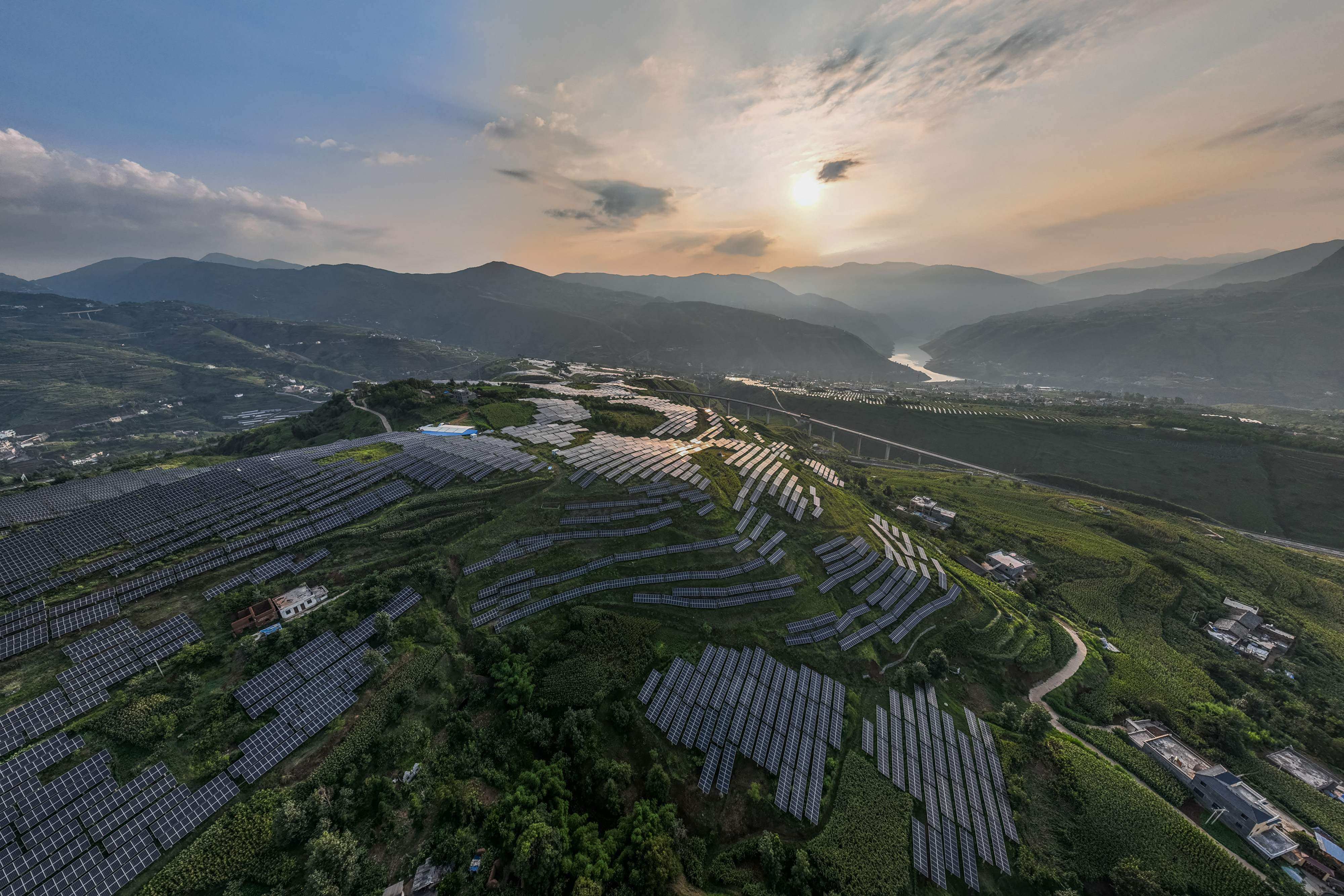 Solar panels are scattered among Sichuan pepper fields in Bijie, in China’s southwestern Guizhou province, on August 16. New research shows China could reach 80 per cent carbon-free electricity as early as 2035 without increasing costs or sacrificing reliability. Photo: AFP