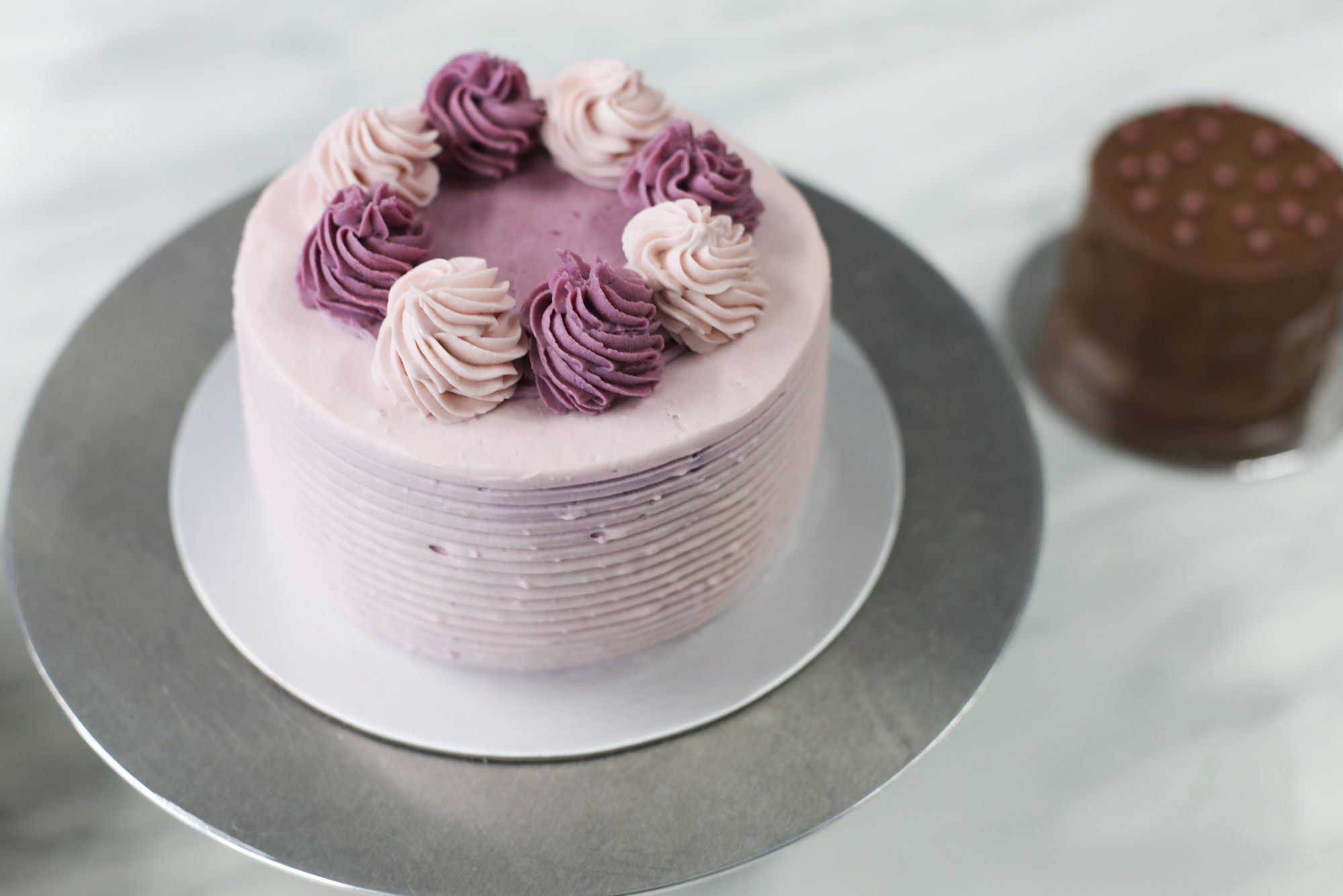 Ube shortcake (left) and chocolate layer cake by Purple Flour Hong Kong. Photo: Xiaomei Chen