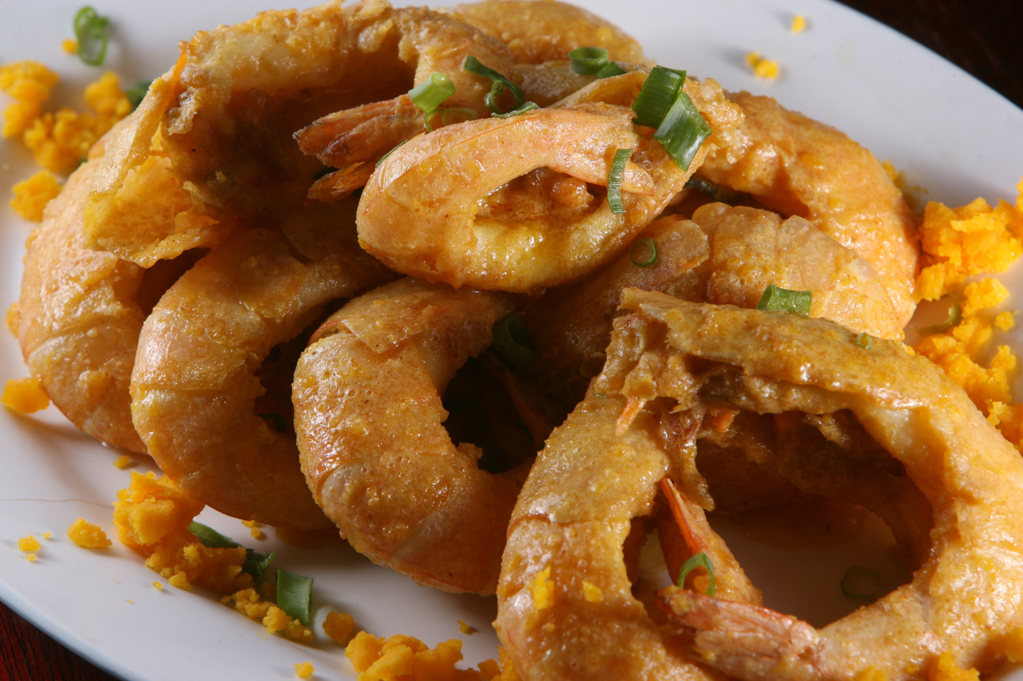 Salted duck egg prawns were a popular menu item at Tung Po Kitchen before its closure on September 2, 2022. Photo: K.Y. Cheng
