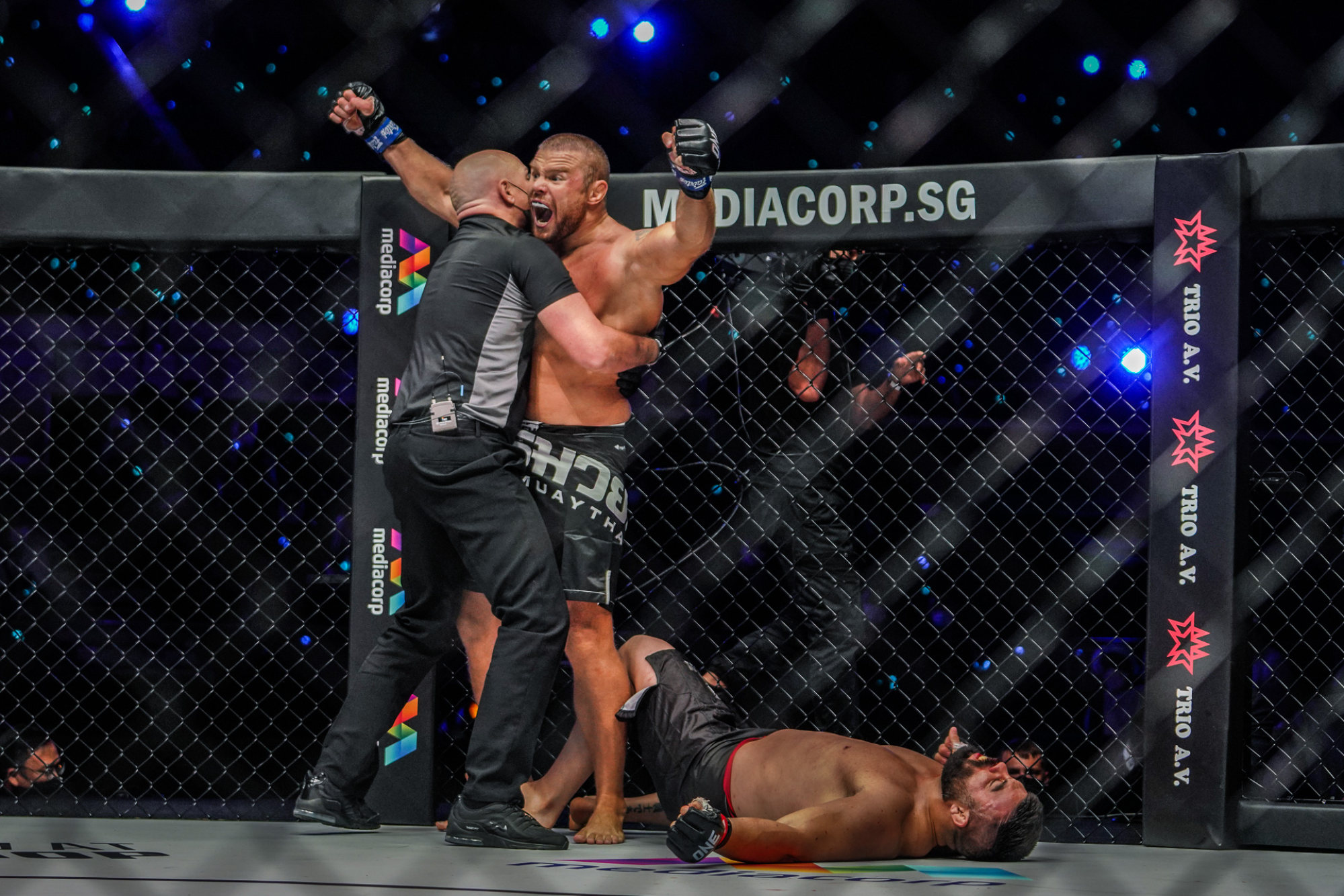 Anatoly Malykhin celebrates after knocking out Amir Aliakbari.
