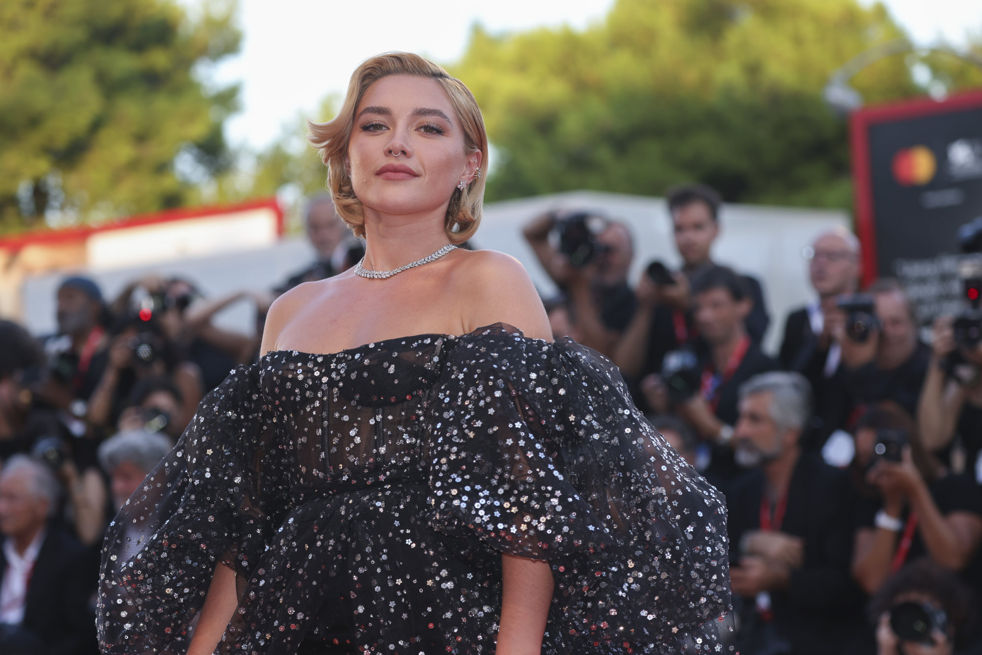 Florence Pugh poses for photographers upon arrival at the premiere of the film Don’t Worry Darling during the 79th edition of the Venice Film Festival on September 5. Photo: Invision/AP
