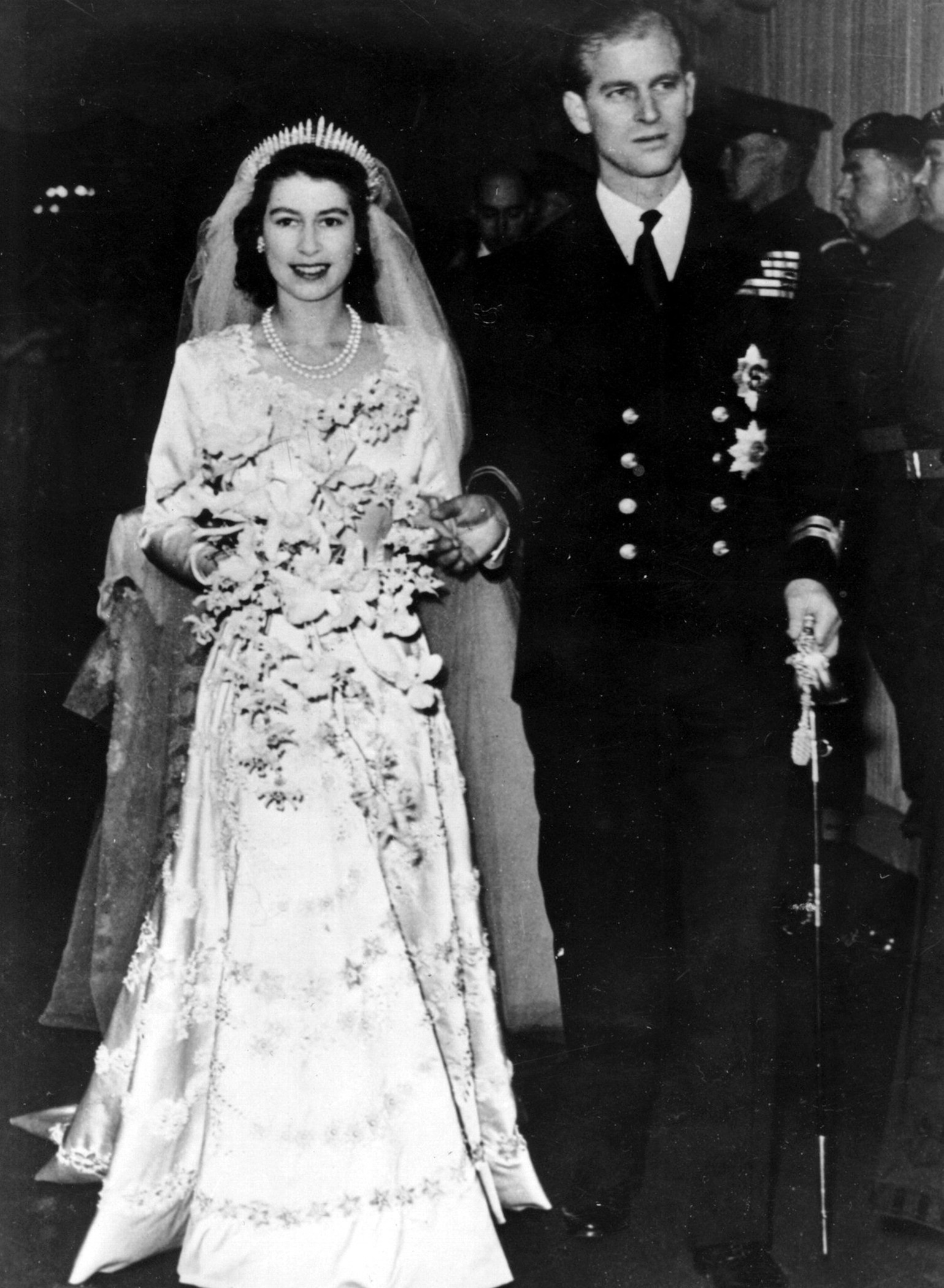 The then Princess Elizabeth wore a dazzling satin wedding dress designed by Norman Hartnell for wedding to Princee Philip in 1947. Photo: AP