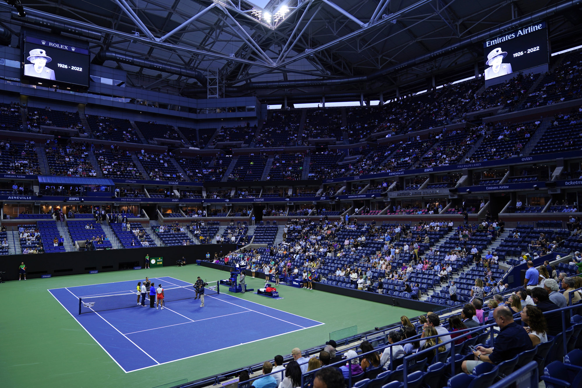 A moment of silence is observed for Queen Elizabeth ahead of a match between Caroline Garcia and Ons Jabeur during the semi-finals of the US Open. Photo: AP