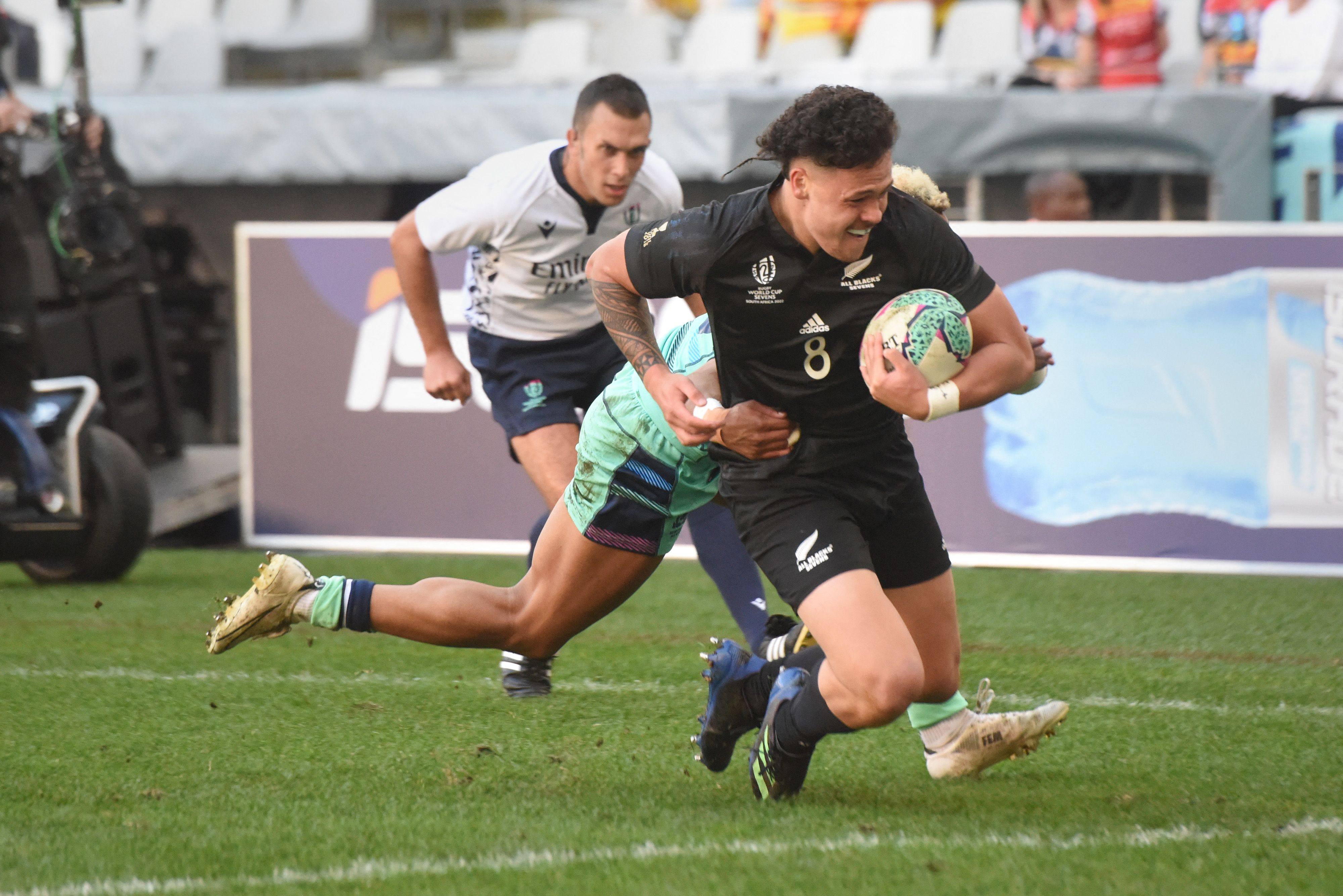 Caleb Tangitau of New Zealand scores a try against Scotland at the Rugby World Cup Sevens in Cape Town. Photo: AFP