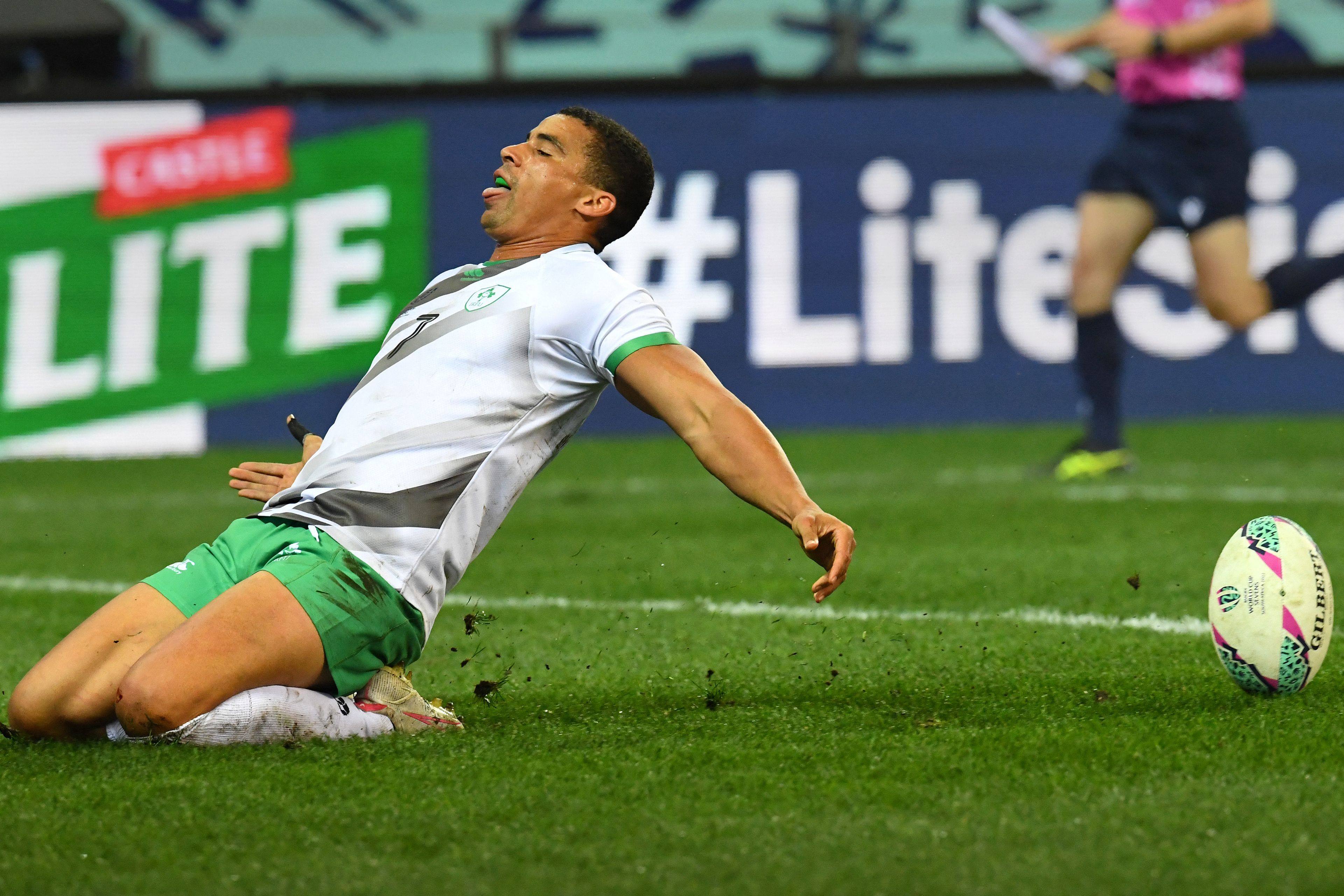 Jordan Conroy of Ireland scores a try against South Africa at the Rugby World Cup Sevens in Cape Town. Photo: AFP