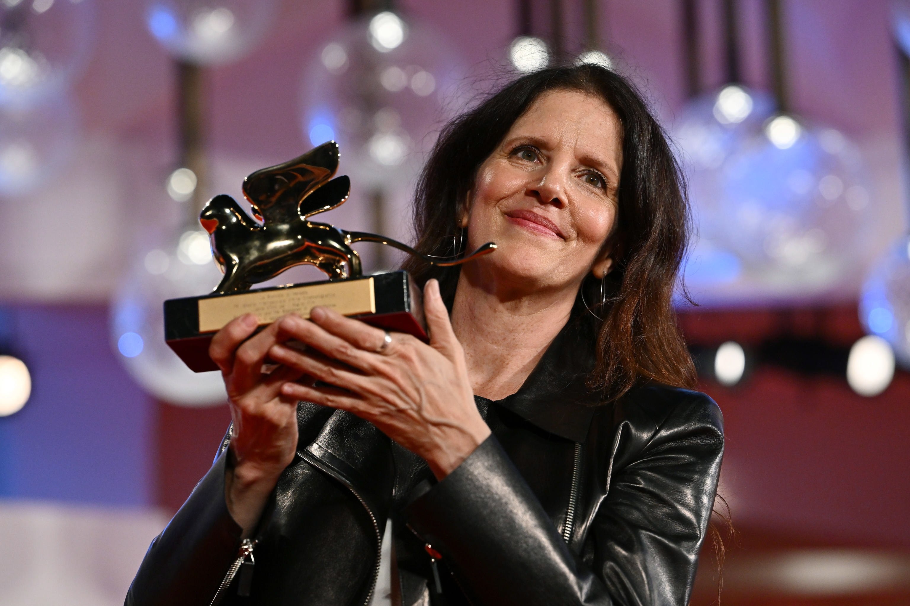 US director Laura Poitras poses with the Golden Lion for Best Film for her film All the Beauty and the Bloodshed during the closing ceremony of the 79th annual Venice International Film Festiva. Photo: EPA-EFE