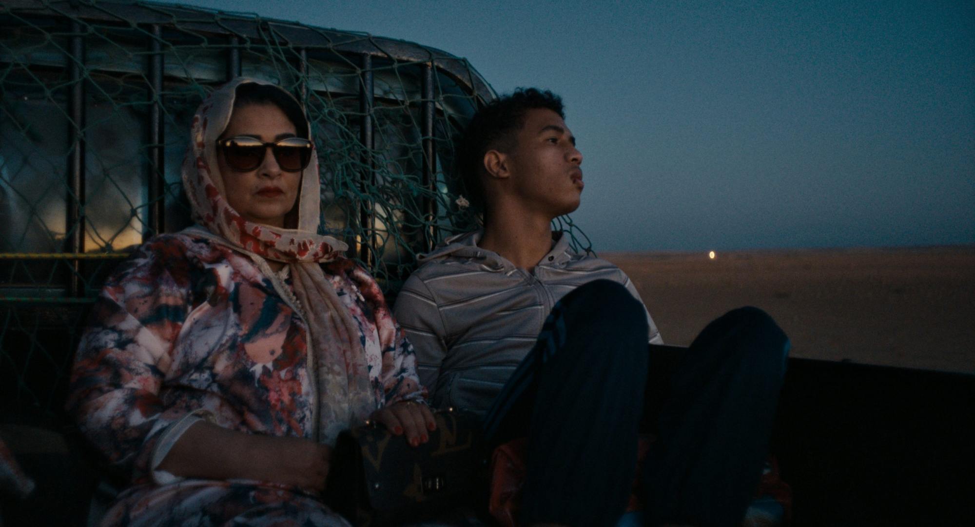 Aicha Tebbae (left) and Abdellah El Hajjouji in a still from The Damned Don’t Cry.