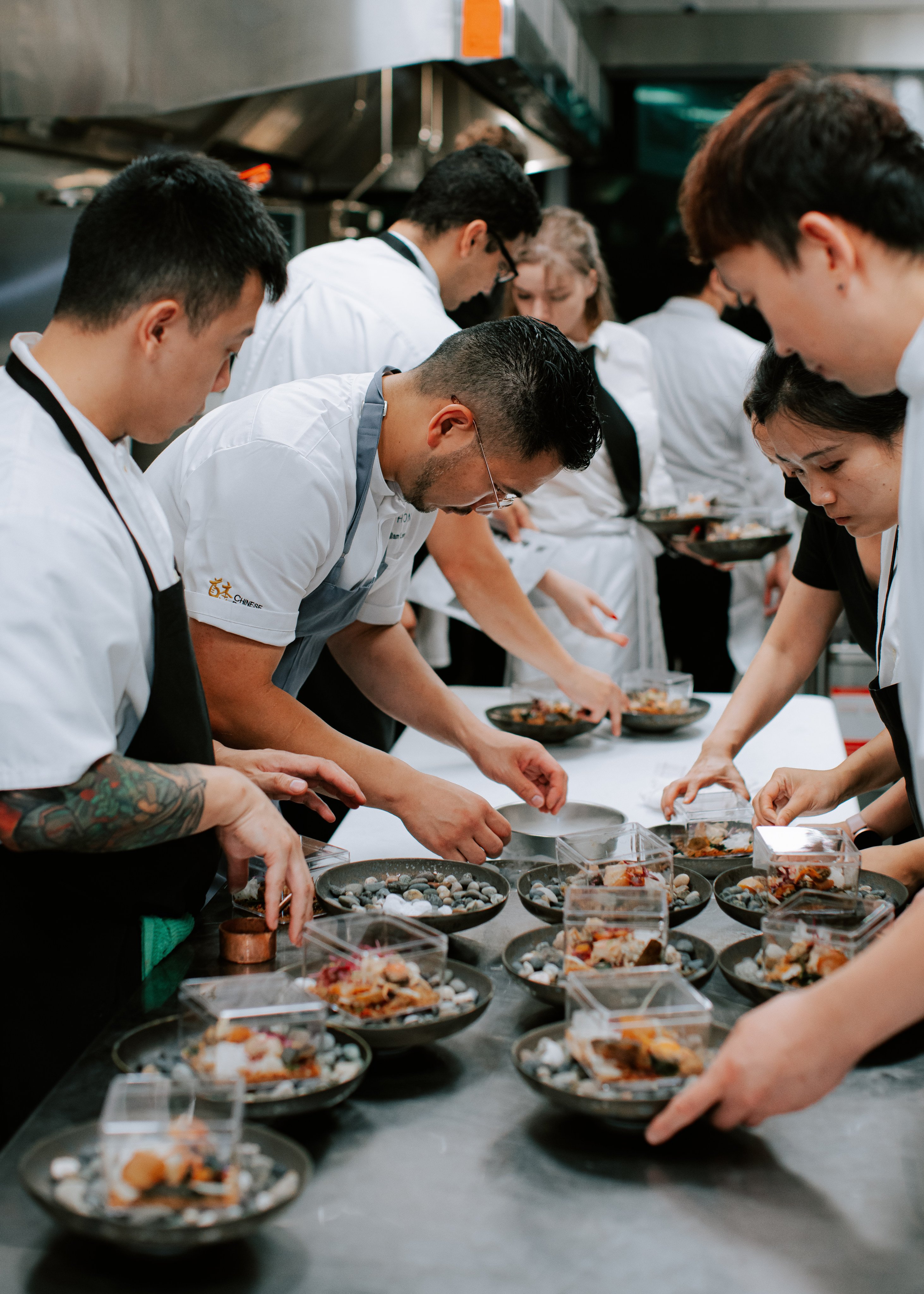Vancouver-based chef William Lew (second from left) prepares a course for the Chinese Restaurant Awards’ dining series “Hong Kong Renaissance”. Photo: Chinese Restaurant Awards