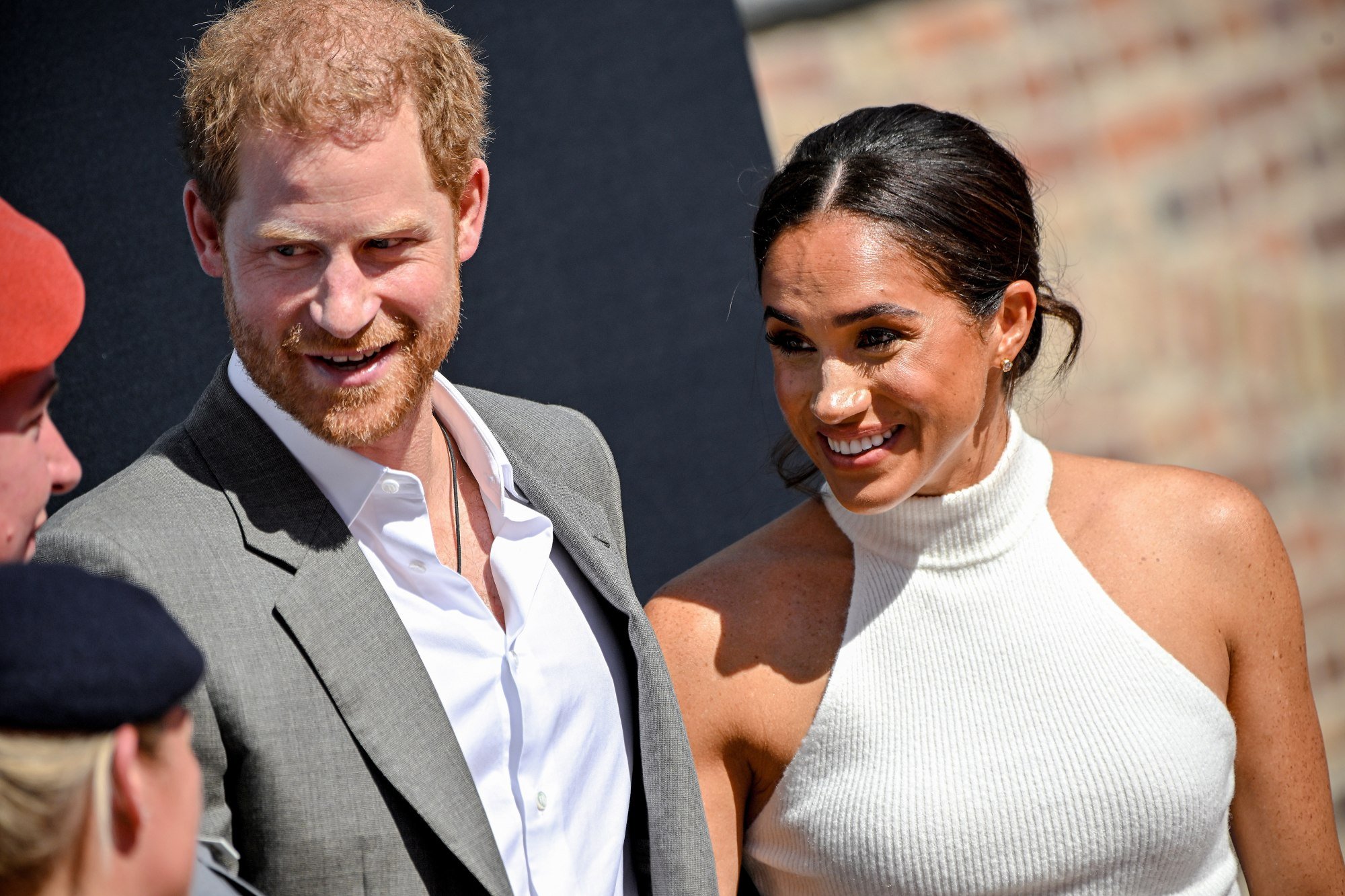 Britain’s Prince Harry and his wife Meghan, the Duke and Duchess of Sussex, speak with onlookers as they represent the 6th Invictus Games 2023, in Düsseldorf, Germany, on September 6. Photo: EPA-EFE