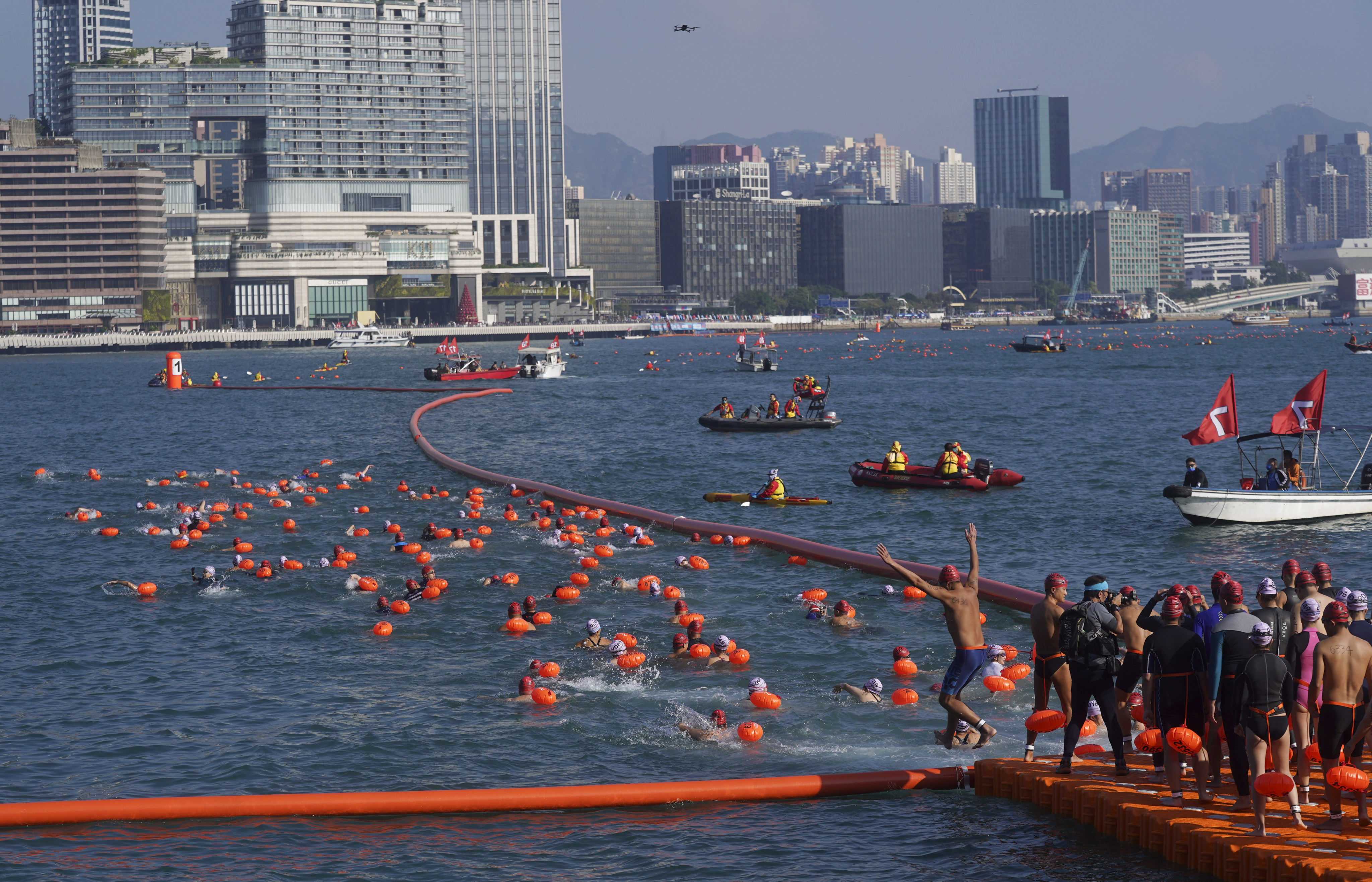 Swimmers join the 2021 Harbour Race from Wan Chai to Tsim Sha Tsui. Photo: Sam Tsang