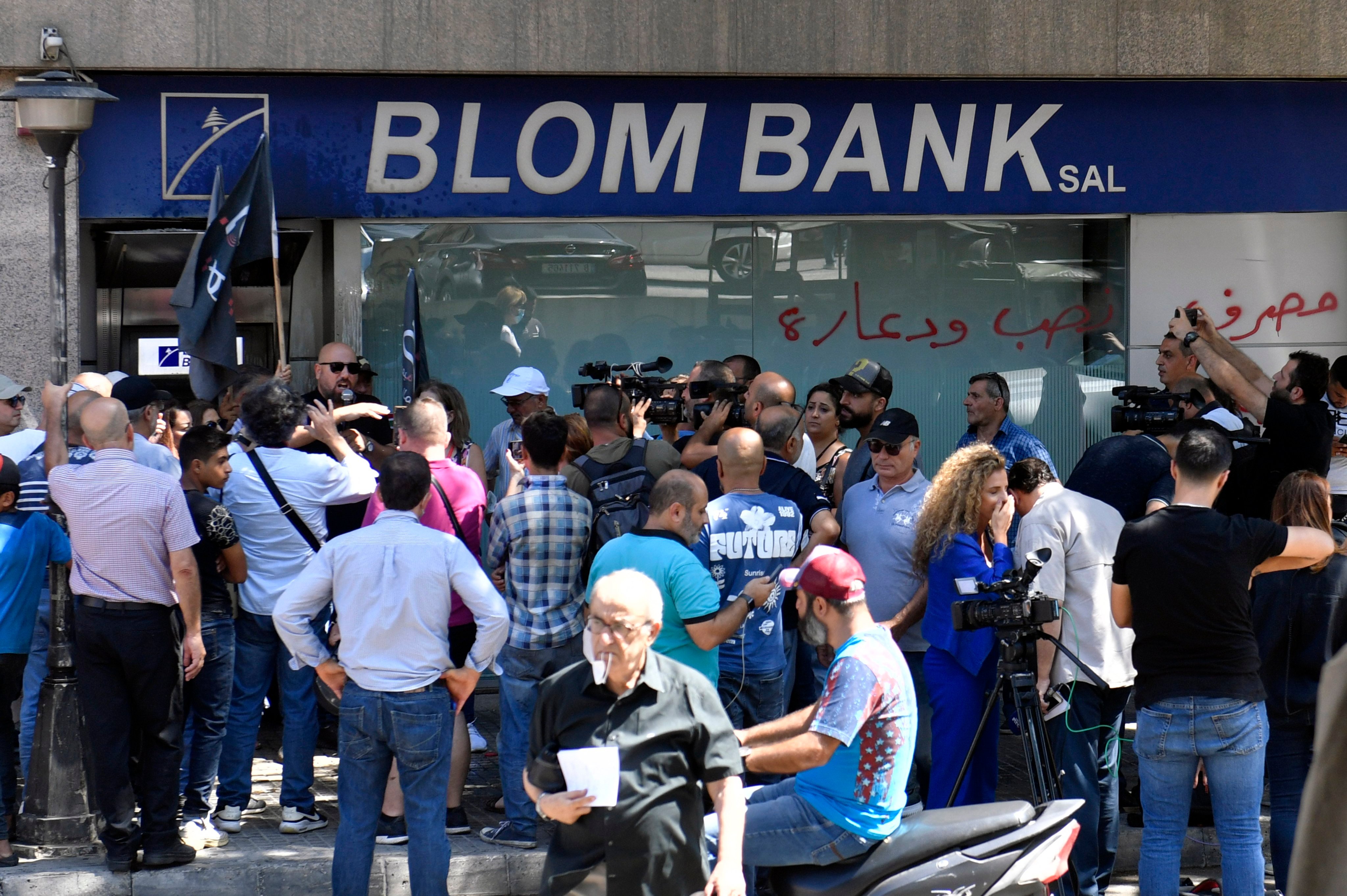 Blom Bank in Beirut, Lebanon, where a group of depositors, including a woman with a toy gun, demanded access to their savings. Photo: EPA-EFE