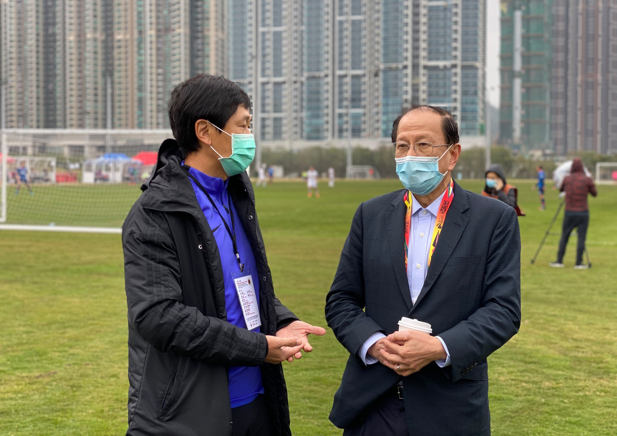 Sports Commissioner Yeung Tak-keung (left) speaks to Hong Kong Football Association chairman Pui Kwan-kay, who needs government approval for the Myanmar visit. Photo: Chan Kin-wa