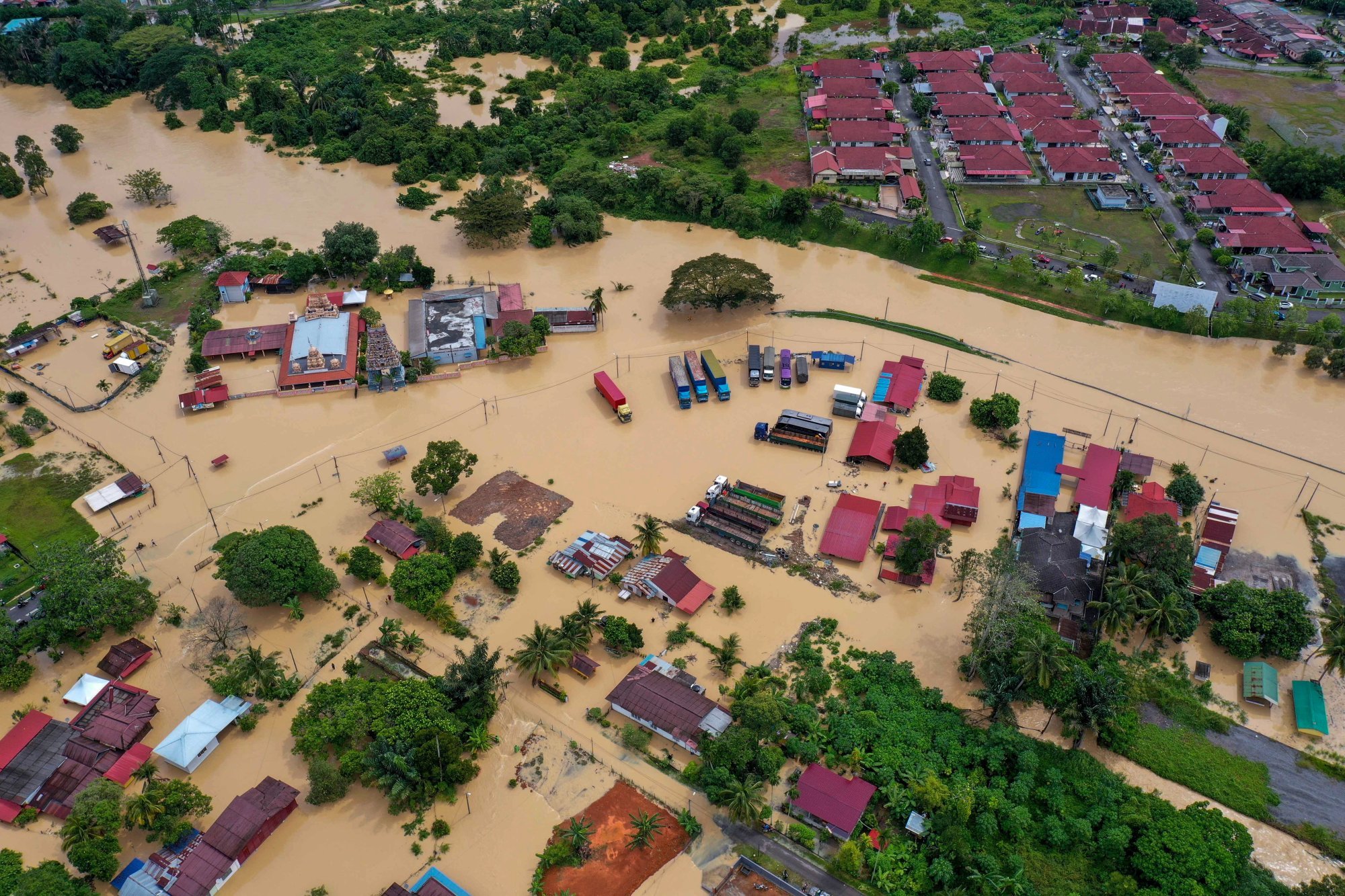 An aerial photo shows major flooding in Malacca following a night of heavy rainfall on January 1, 2022. Photo: Bernama/dpa