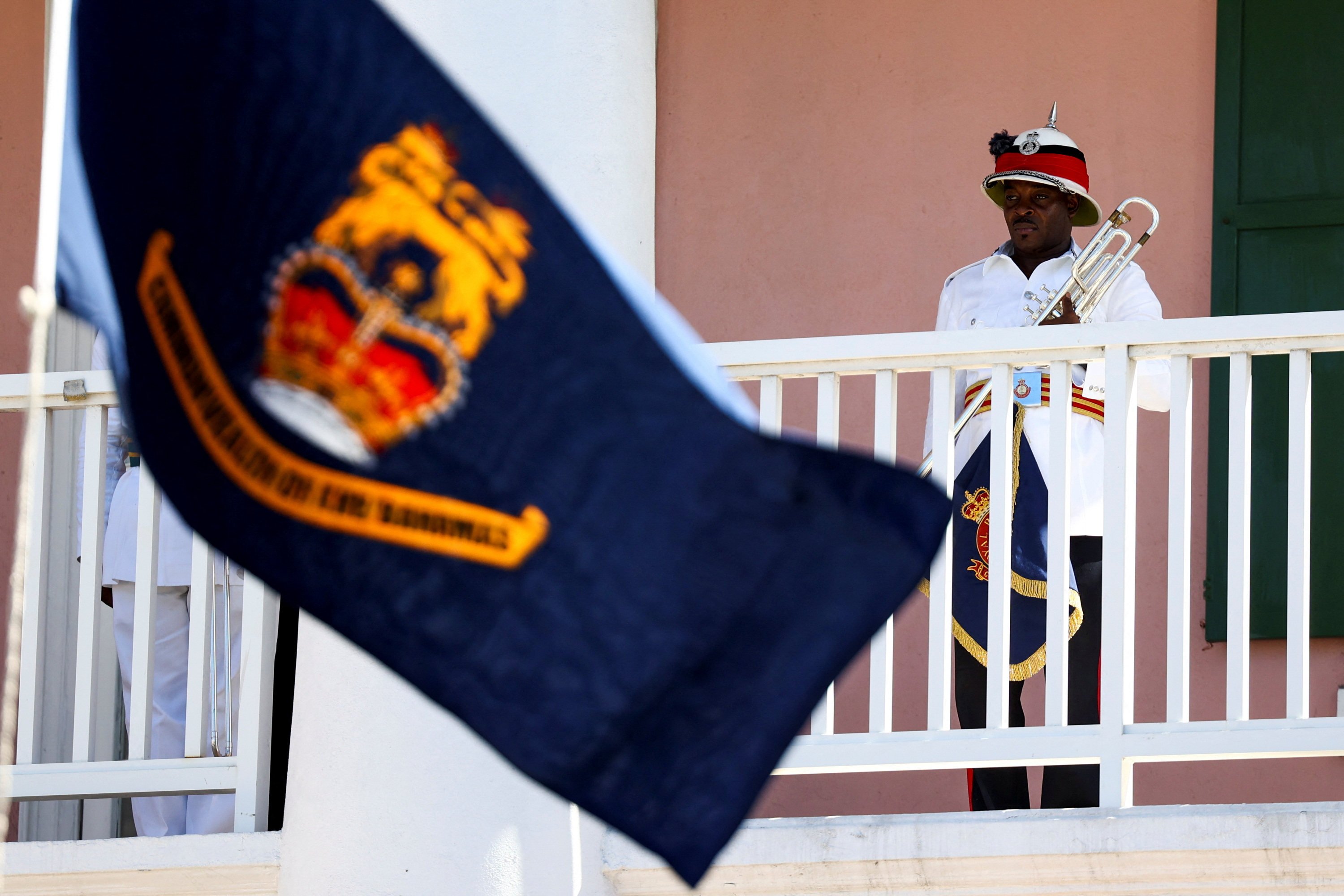 A Royal Bahamas Police Force officer holds a trumpet during a ceremony to proclaim King Charles III as the new head of state of the Commonwealth of the Bahamas during a ceremony in Nassau, Bahamas, on September 11.  Photo: Reuters 