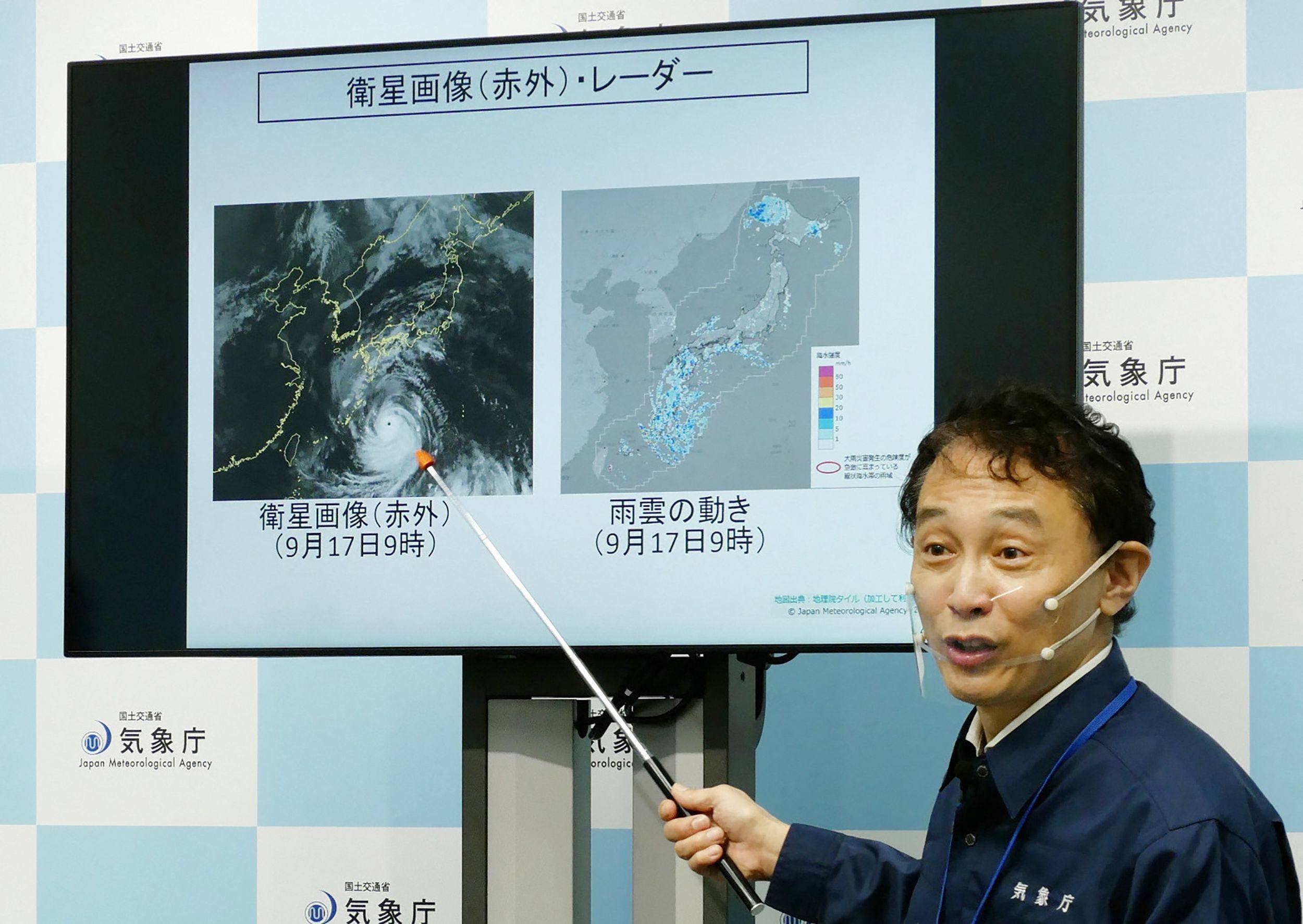 A director of the Japan Meteorological Agency’s Forecast Division holds a press conference on Typhoon Nanmadol in Tokyo on September 17. There are risks of unprecedented storms, high waves, storm surges, and record rainfall. Photo: JIJI Press/AFP