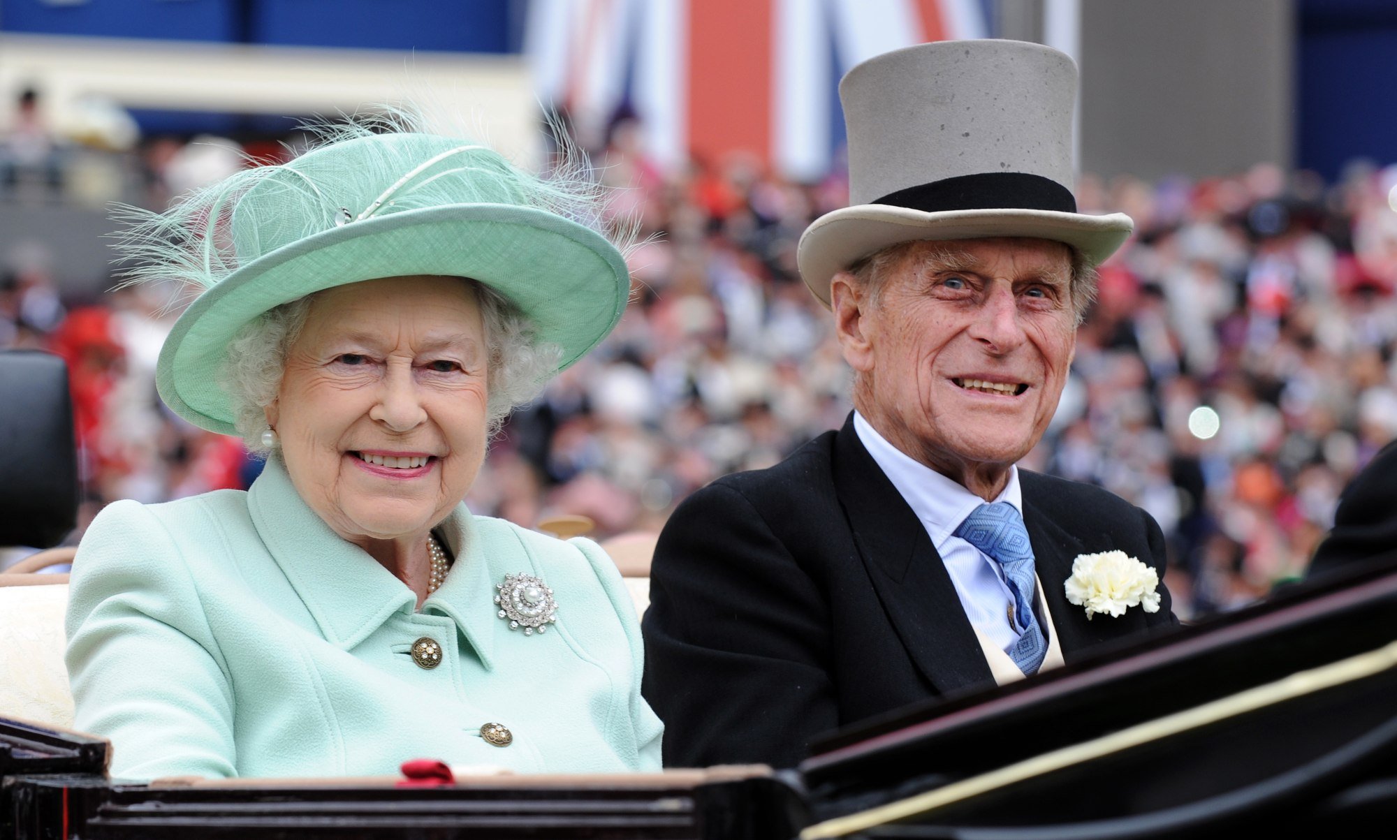 Queen Elizabeth and her husband, Prince Philip, Duke of Edinburgh arrive to attend Ladies Day at the Royal Ascot race meeting in June 2012. Photo: EPA-EFE