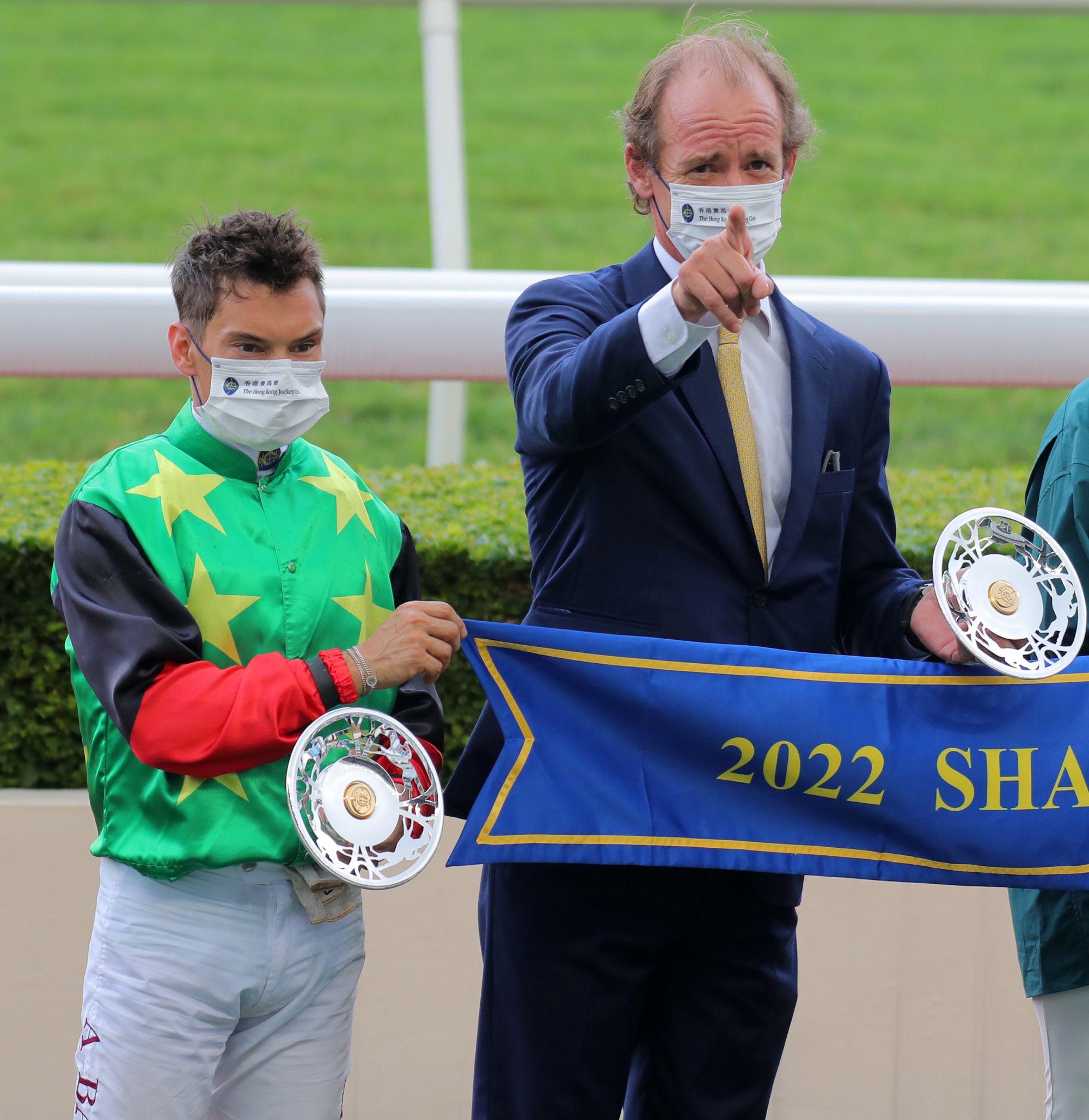 Jockey Alexis Badel and trainer Richard Gibson celebrate a Cordyceps Six victory.