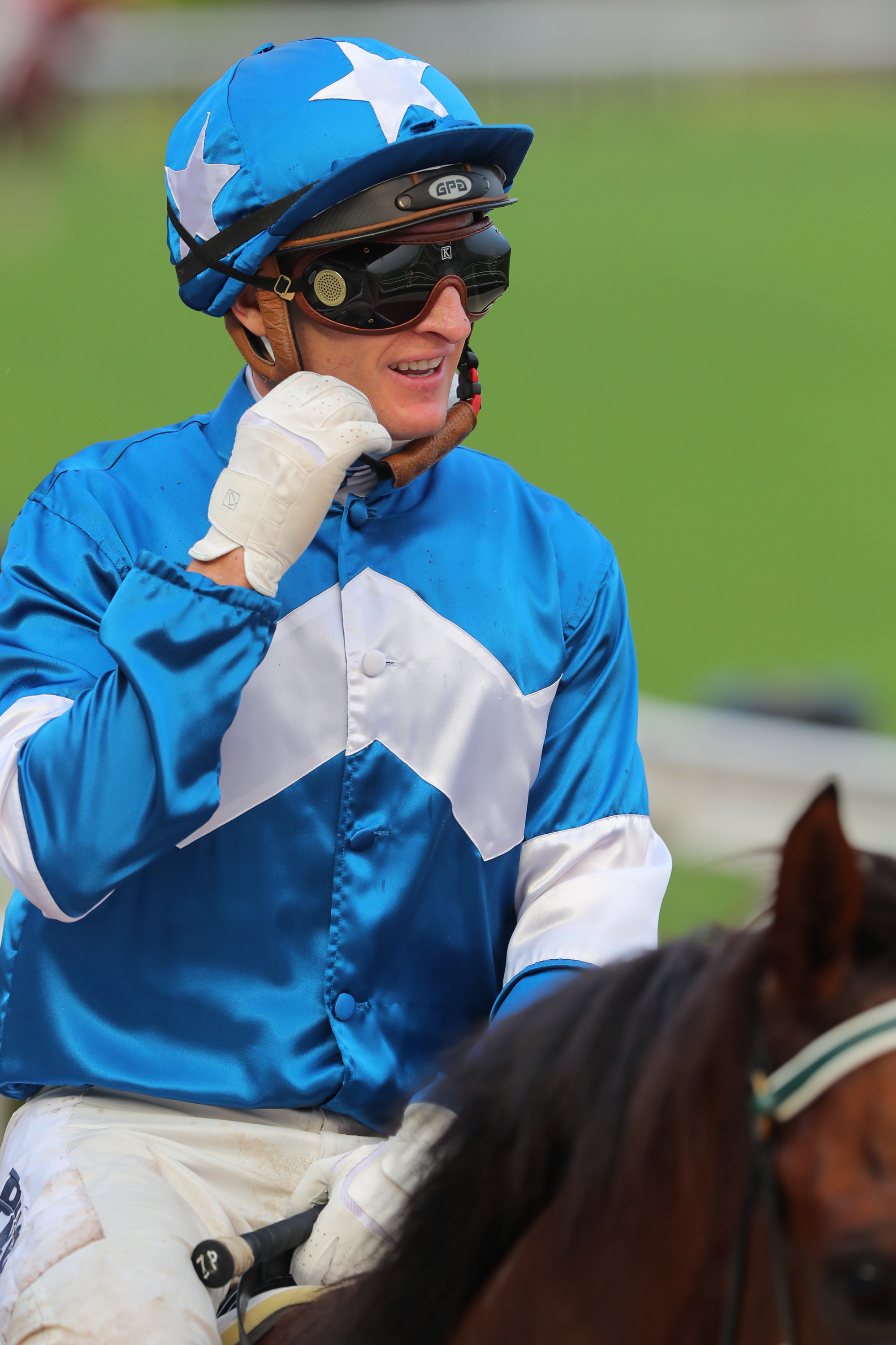 Zac Purton is all smiles after riding Lucky With You to victory in the Class Two Fife Handicap (1,000m) at Sha Tin.