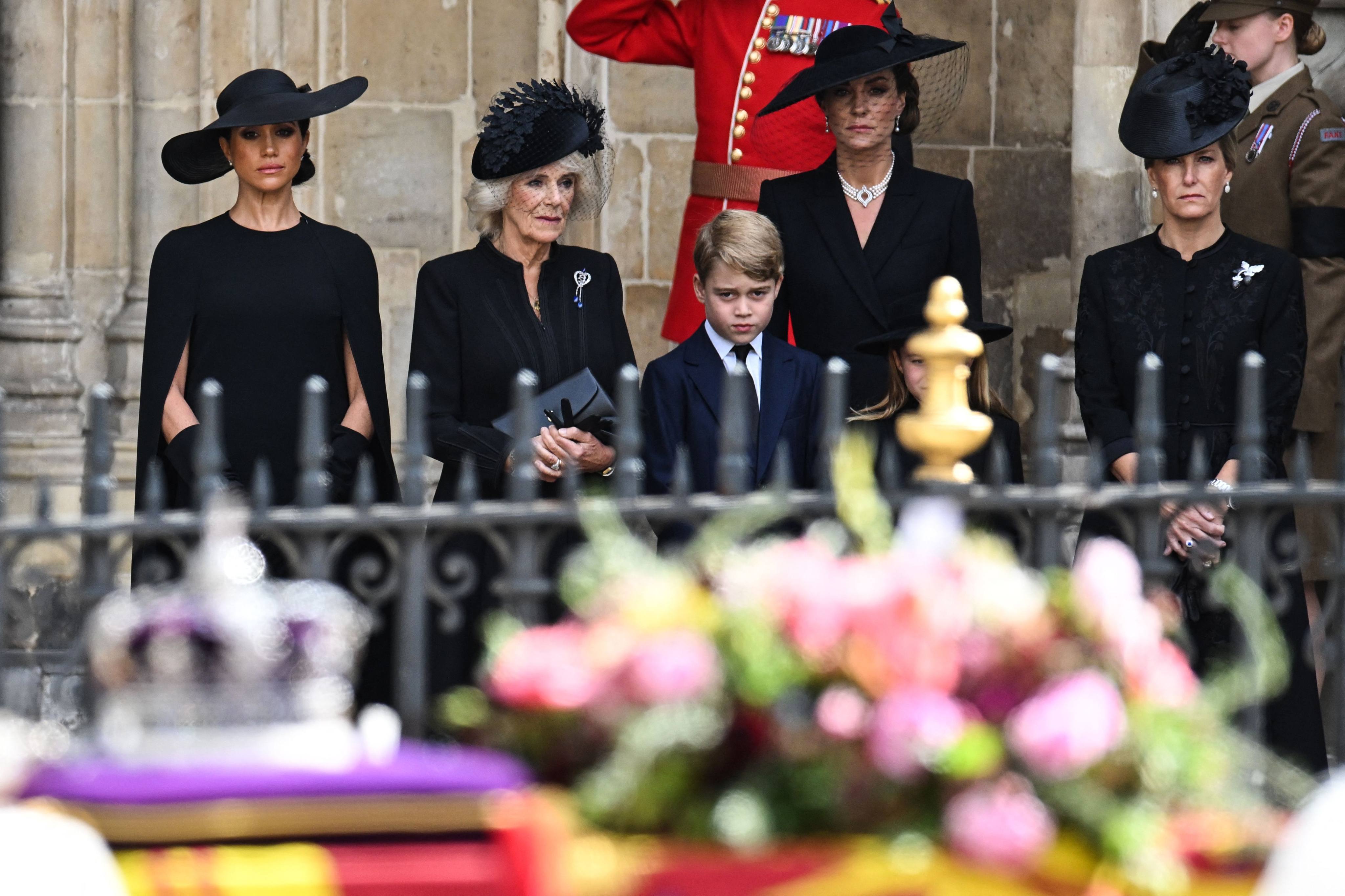 Meghan, Duchess of Sussex and Camilla, queen consort leave Westminster Abbey in London on September 19, after the state funeral service for Queen Elizabeth. Photo: AFP