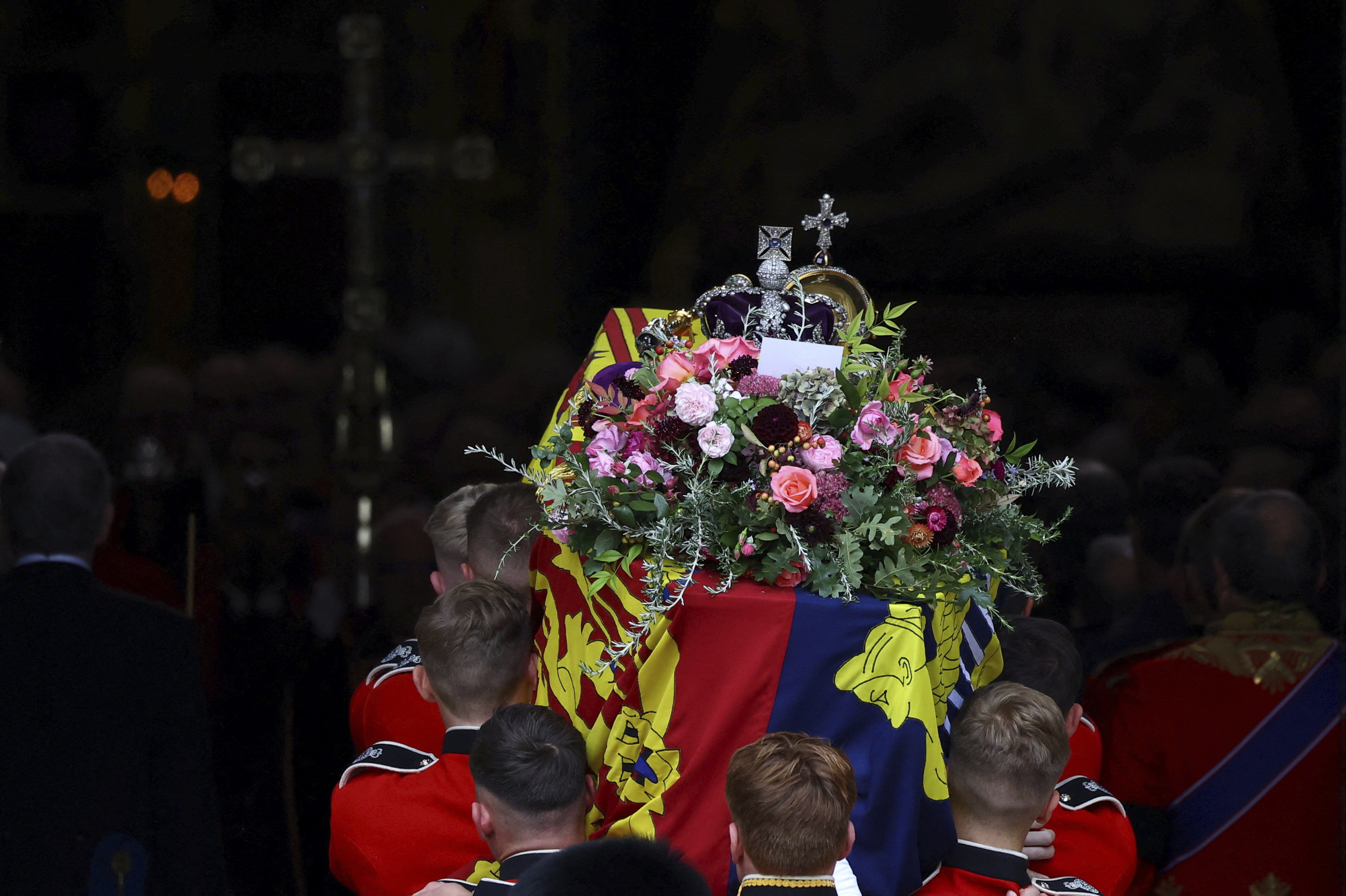 The coffin of Britain’s Queen Elizabeth is carried into the Westminster Abbey, during her funeral in London on September 19. The list of absentees from Monday’s funeral revealed the deep divisions roiling global geopolitics. Photo: AP