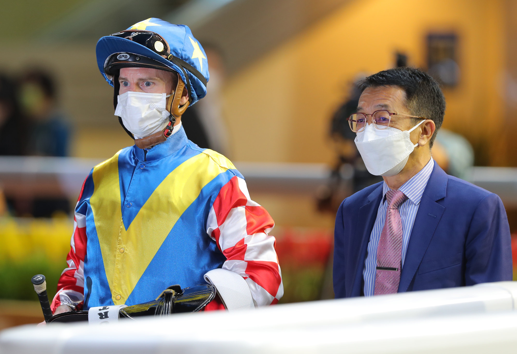 Jockey Zac Purton and trainer Me Tsui after Telecom Fighters’ victory.