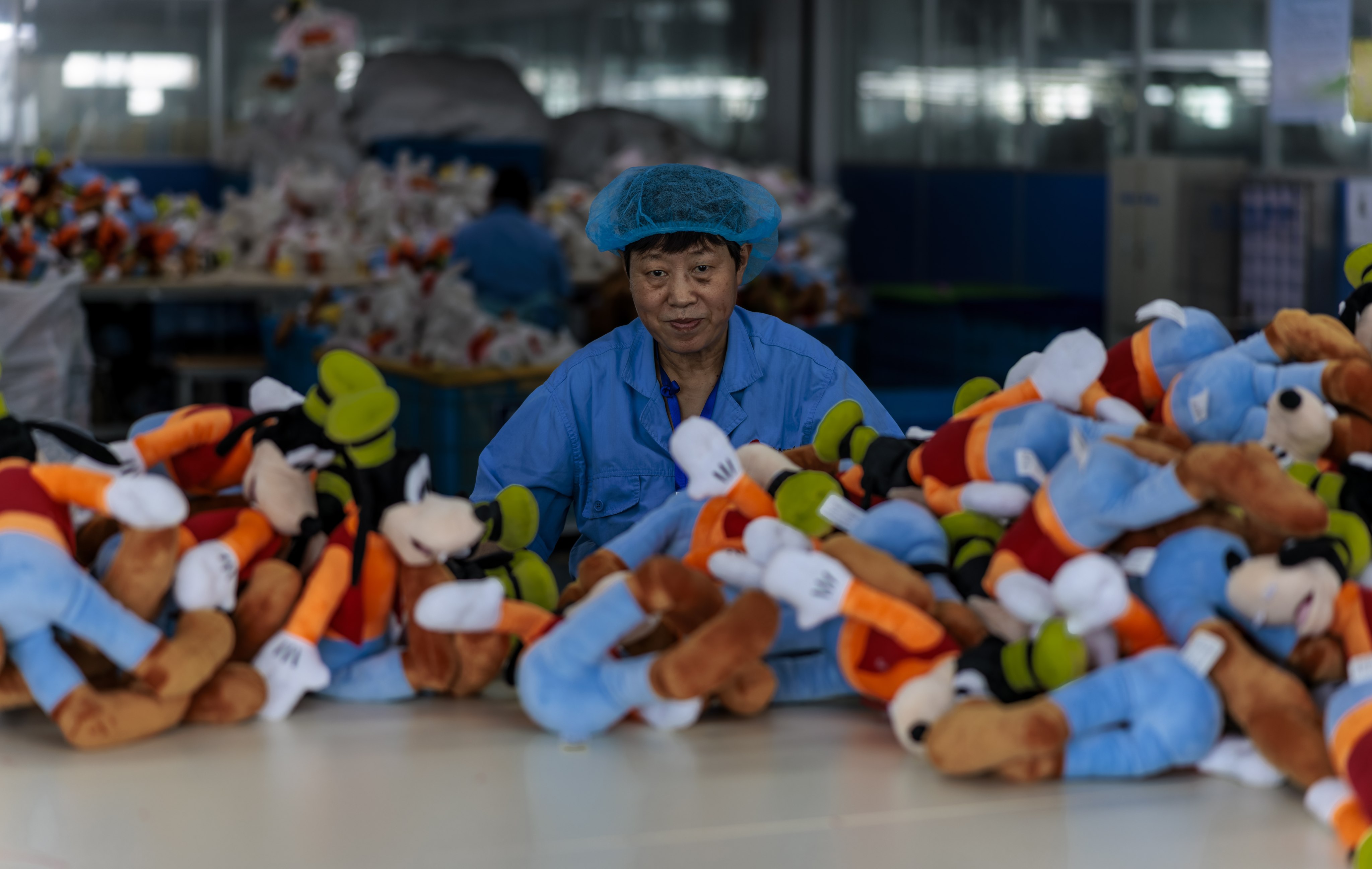 An employee works at a toy factory in Yangzhou, Jiangsu province. Export trade trade remains the most obvious channel through which weakening demand in the US and Europe can affect China. Photo: EPA-EFE 